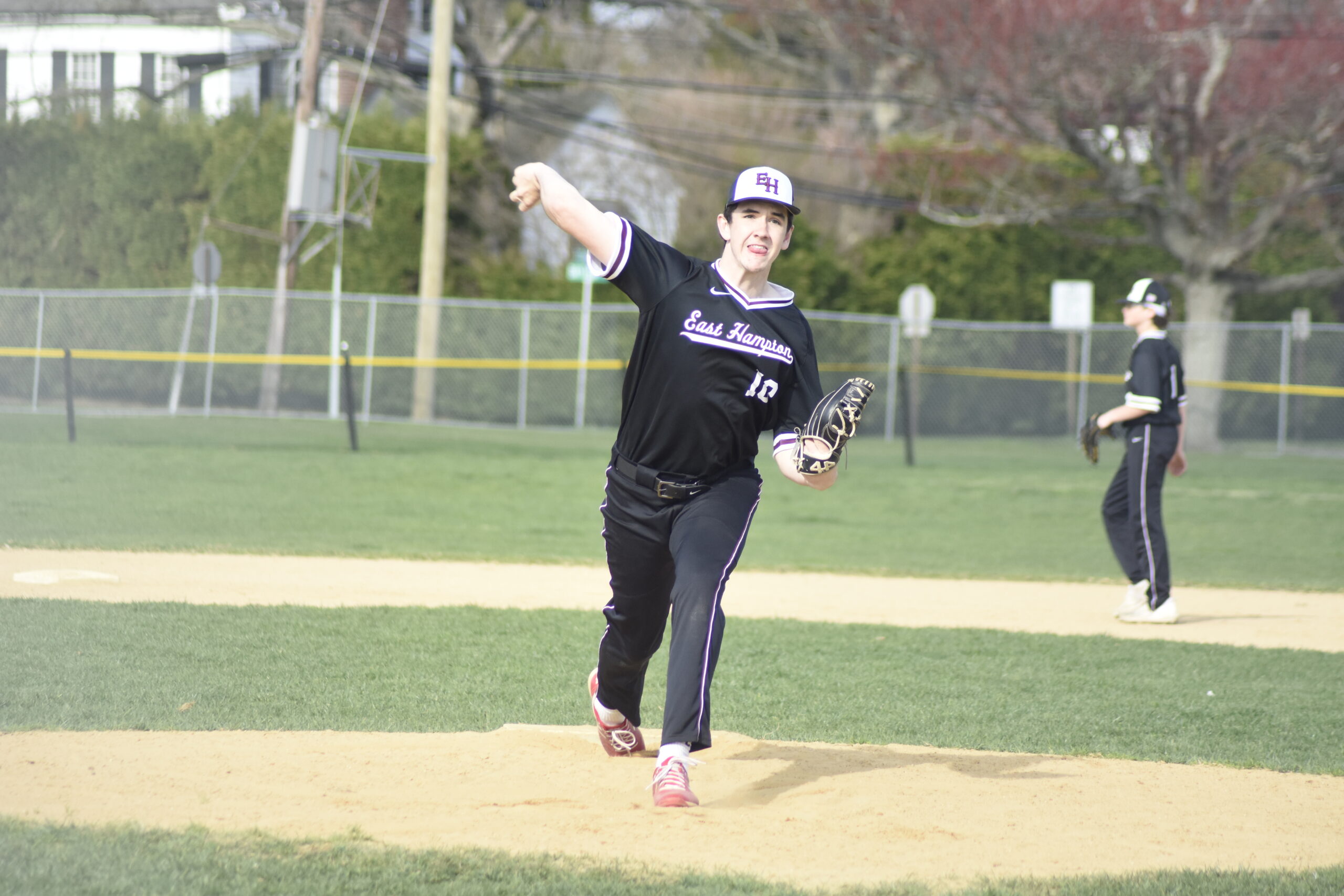 East Hampton senior Colin Ruddy pitched five perfect innings against Amityville on April 14 and struck out 11.   DREW BUDD