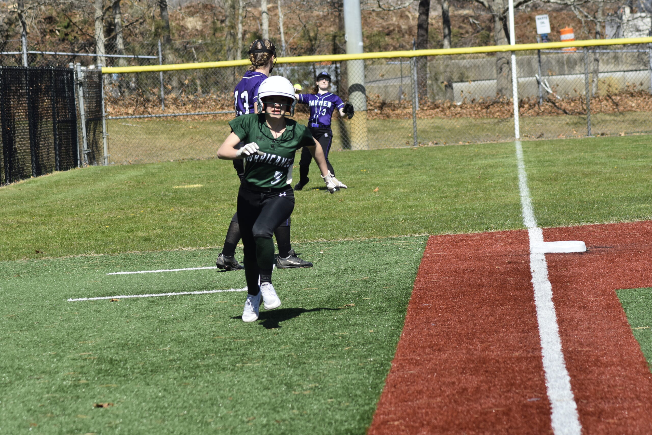 Ashley Erbis rounds third and scores the first run of the game in a 12-0 victory over Hampton Bays at Red Creek Park this past Friday.    DREW BUDD