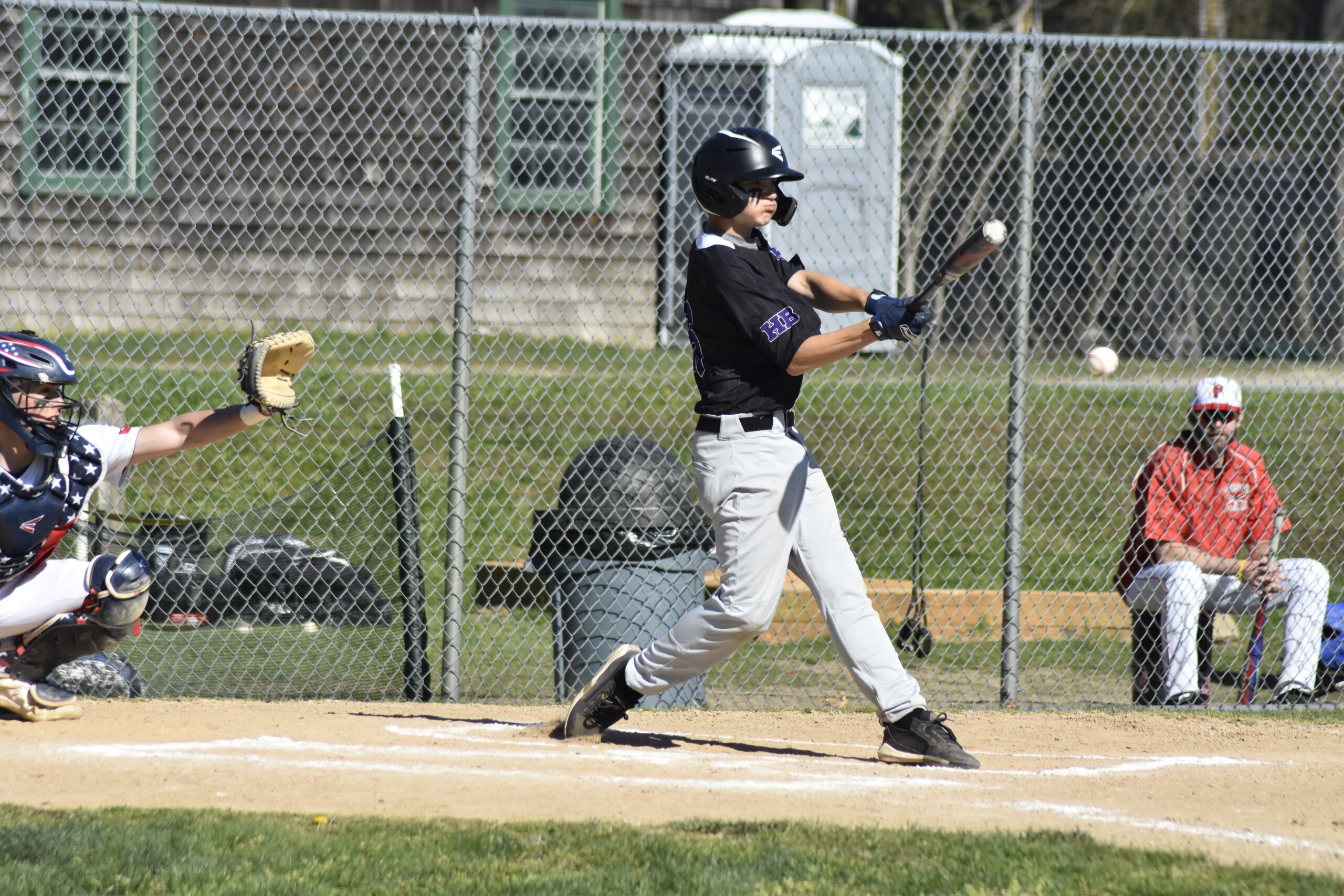 C.J. Peterson puts a ball in play for Hampton Bays.     DREW BUDD