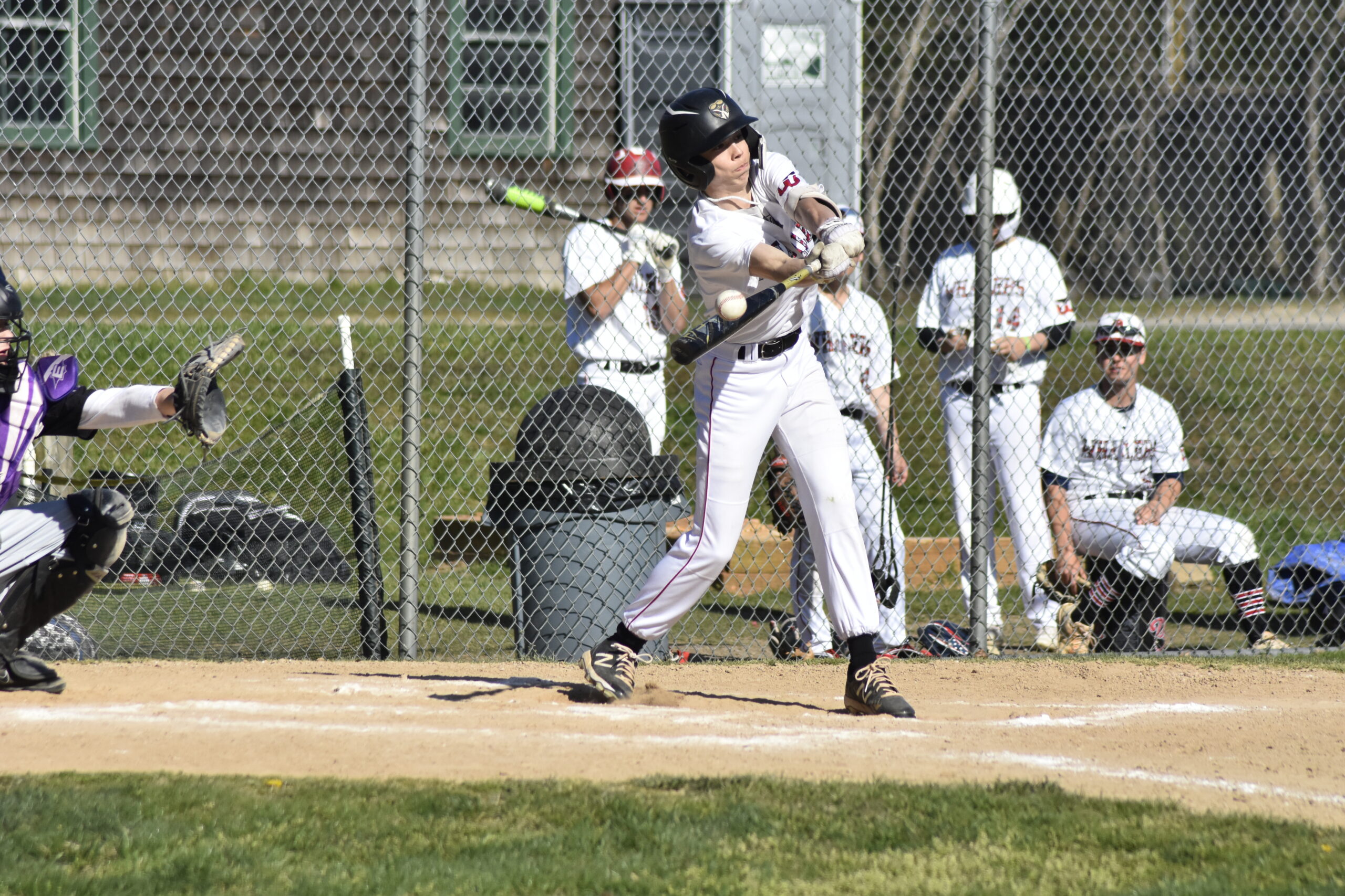 Whaler Dominick Mancino makes contact with a pitch.   DREW BUDD