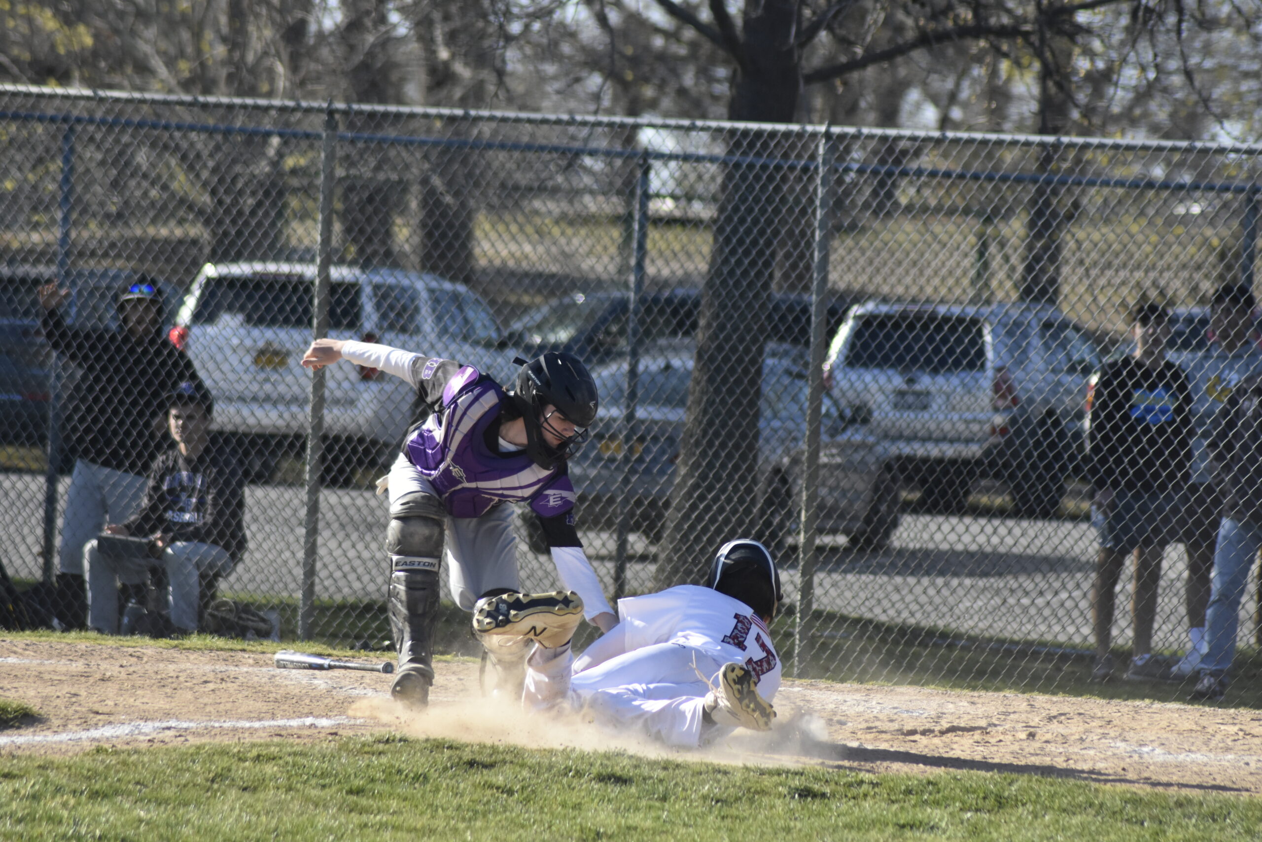 Hampton Bays catcher Aidan Kamp tags out a Pierson runner trying to score.   DREW BUDD