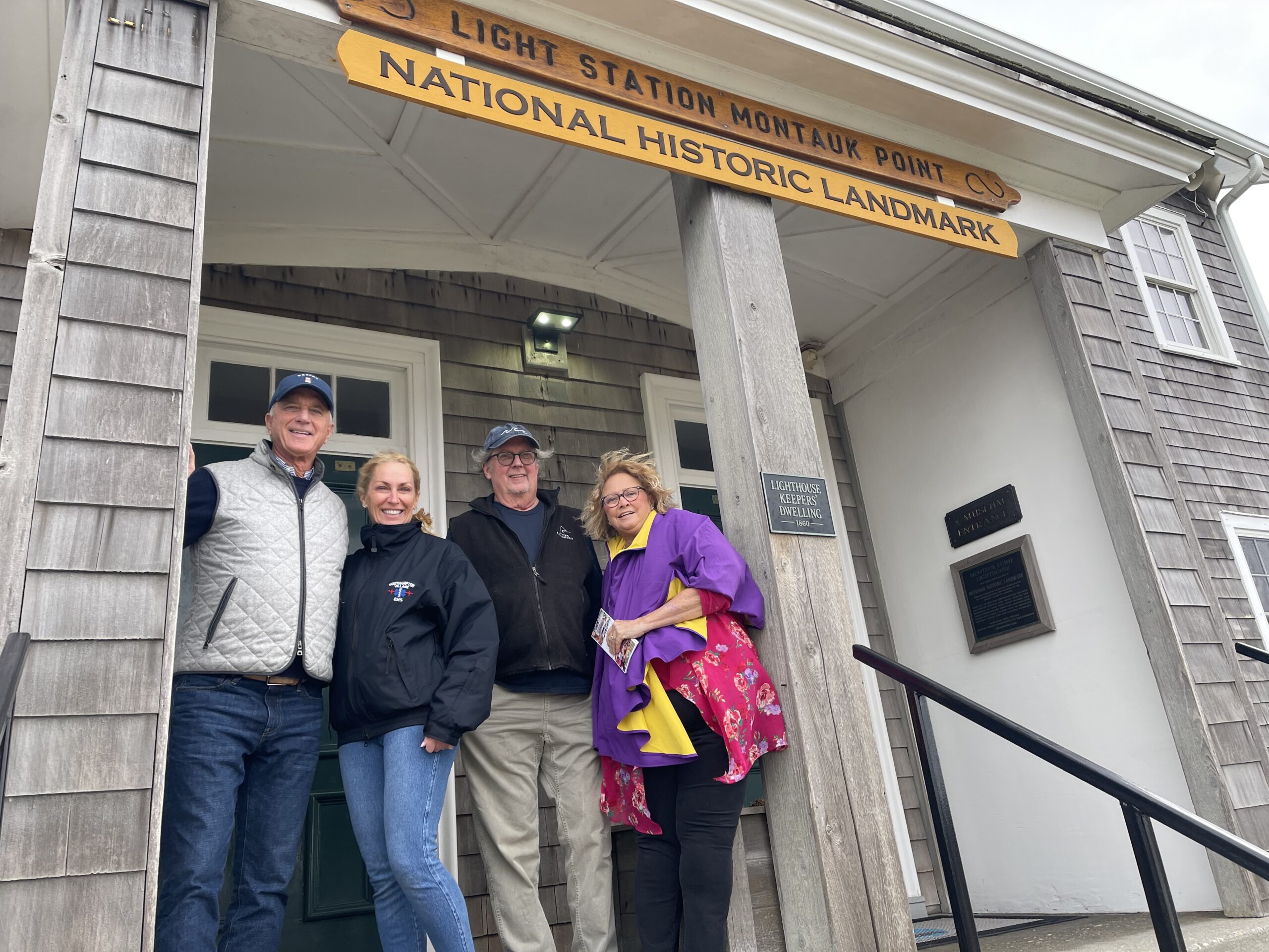 Montauk Point Lighthouse Keeper Joe Gaviola, Stacy Quarty, Bill Becker and Susie Roden at the lighthouse, which will host the Beacon of Hope 5K this June to support the Coalition for Women's Cancer and Lucia's Angels.  Kathryn Menu