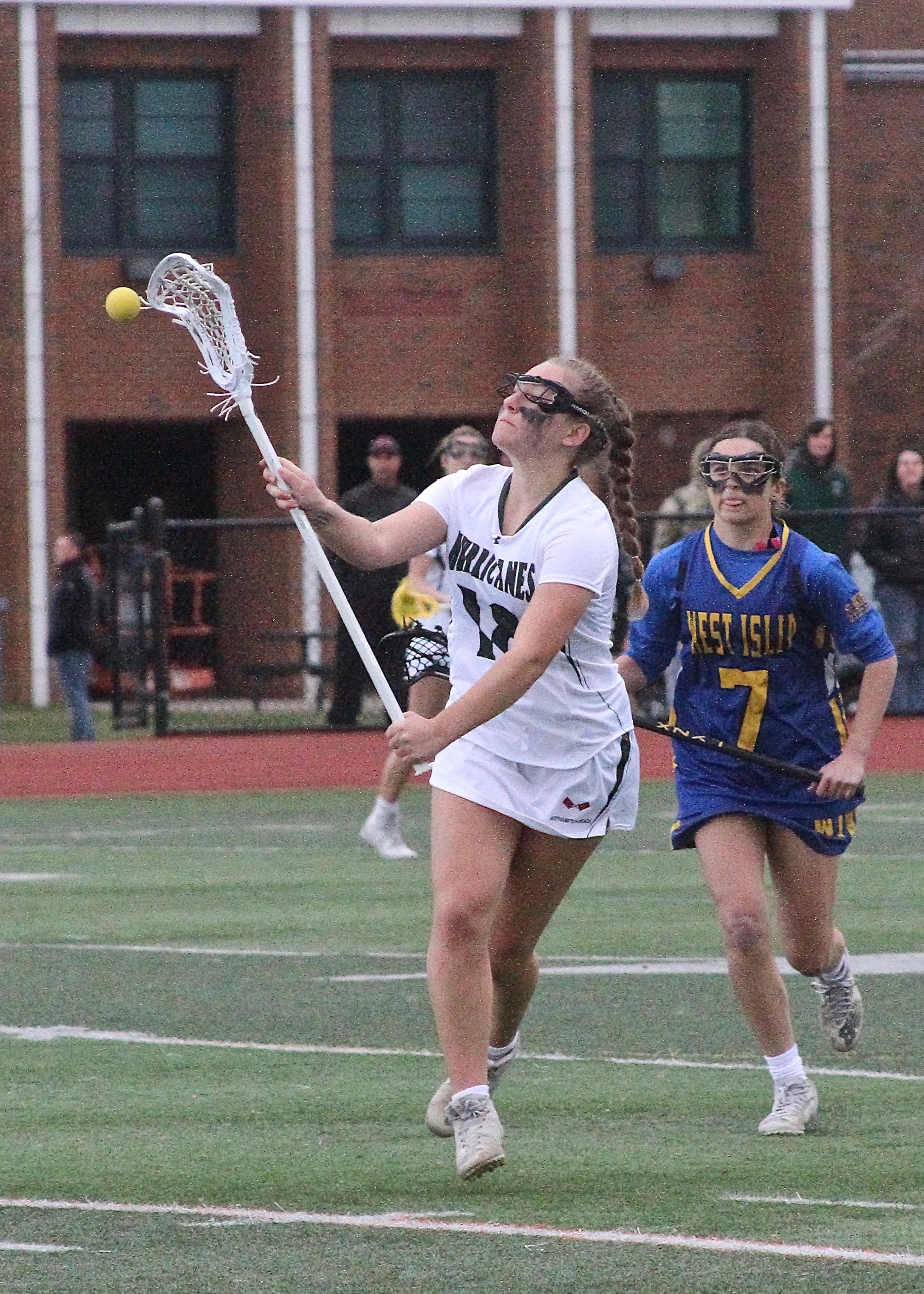 Westhampton Beach sophomore Chloe Mosher passes the ball through midfield. DESIRÉE KEEGAN