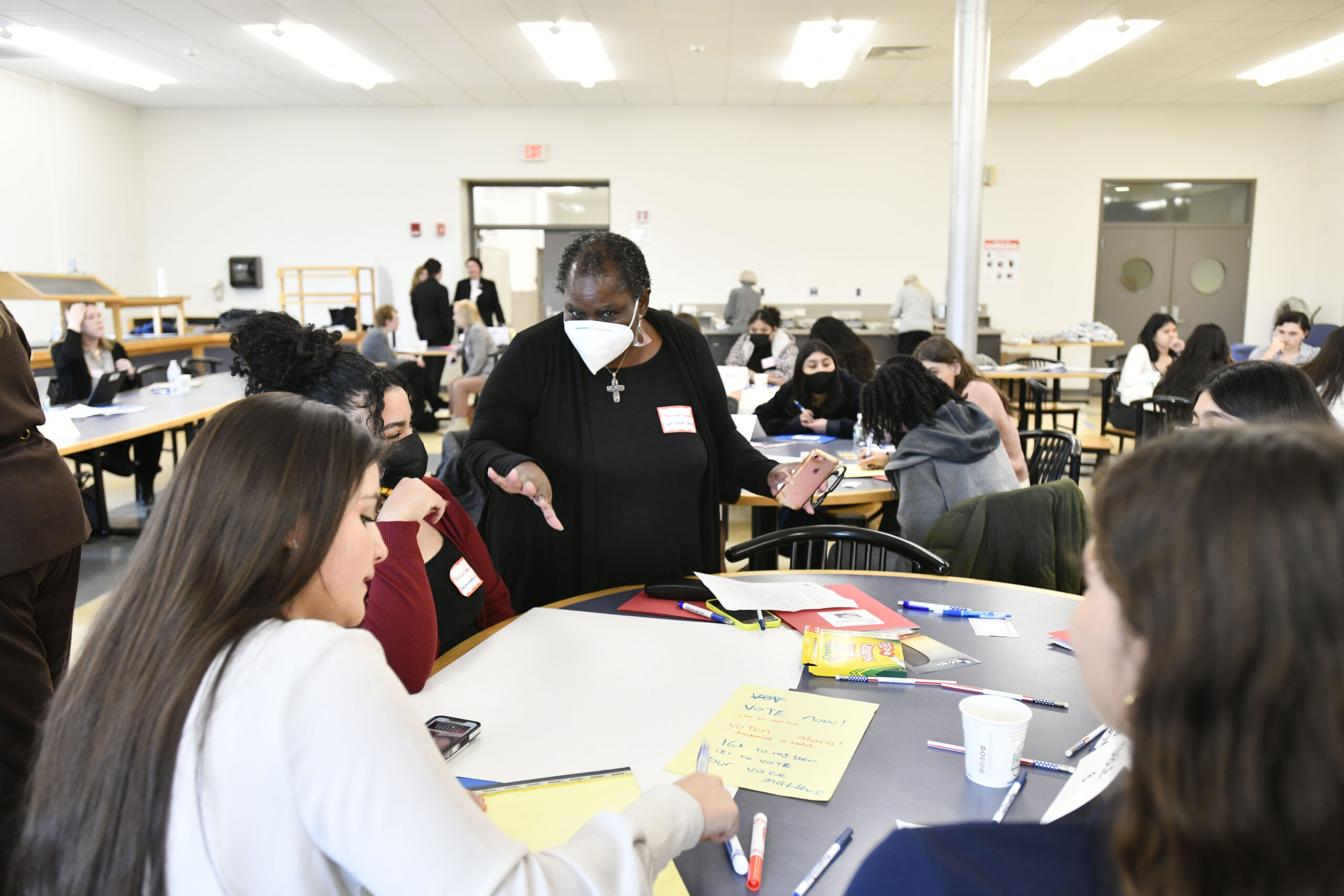 Former Southampton Village Trustee and The Bridgehampton Child Care & Recreational Center Executive Director, Bonnie Cannon works with students at the League of Women Voters of the Hamptons, Shelter Island and the North Fork “Running and Winning” workshop on Thursday.  DANA SHAW