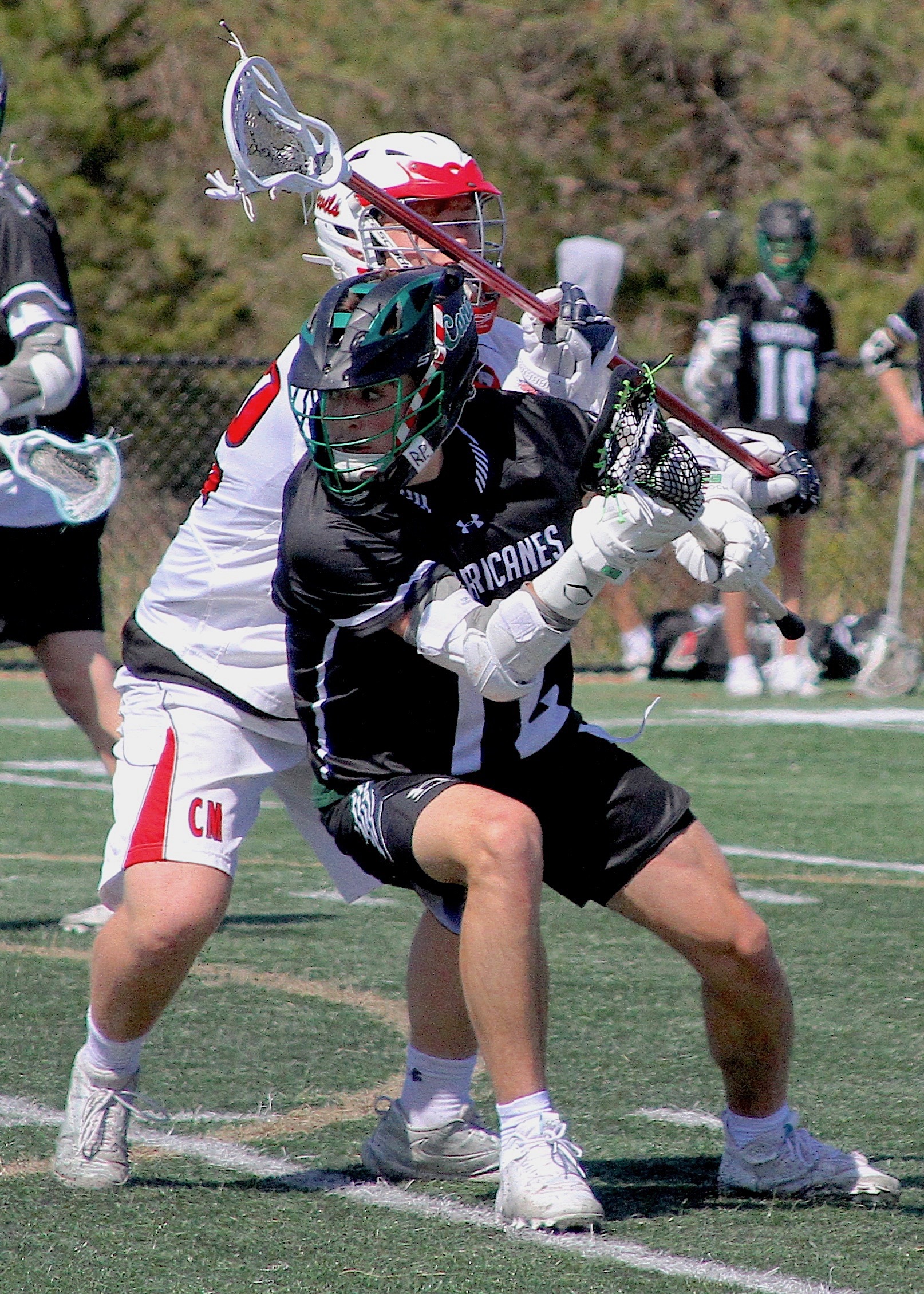 Senior attack Dan Naglieri pivots around a Center Moriches defender. DESIRÉE KEEGAN