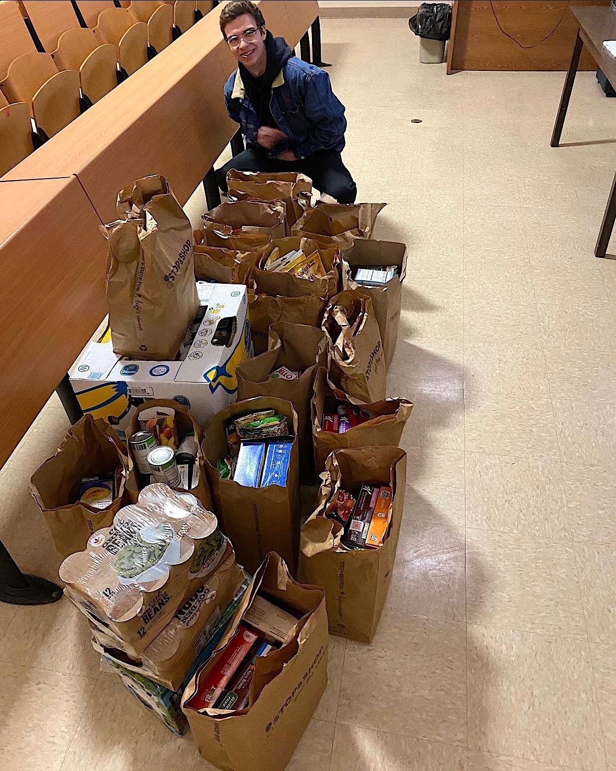 Hampton Bays High School senior Ben Madison unloads donations from the local Stop & Shop for the district's food pantry. HAMPTON BAYS SCHOOL DISTRICT