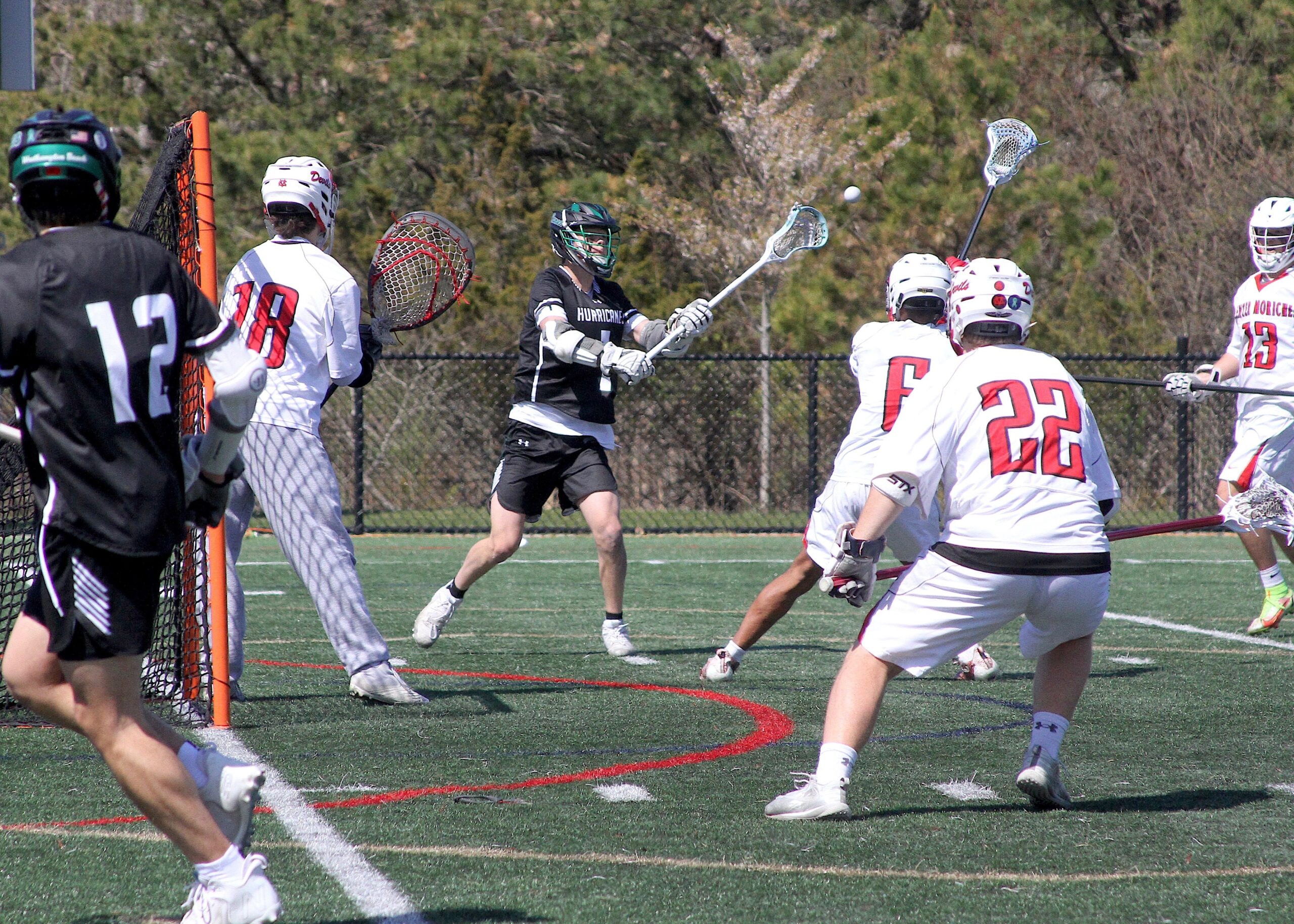 Senior attack Gavin Arcuri passes the ball out to a teammate. DESIRÉE KEEGAN