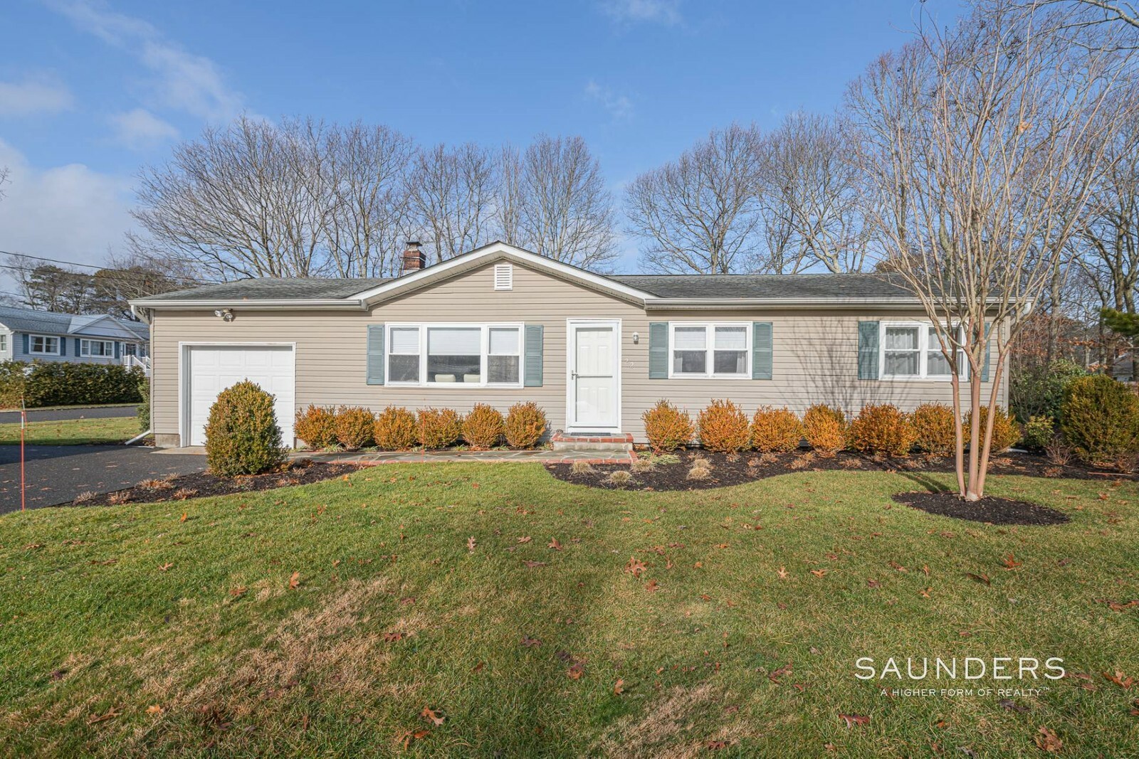 22 Holzman Drive in Hampton Bays, home to a nearly 1,200-square-foot house on .35 acres, is currently under contract, with a last listed price of $629,000. COURTESY SAUNDERS & ASSOCIATES