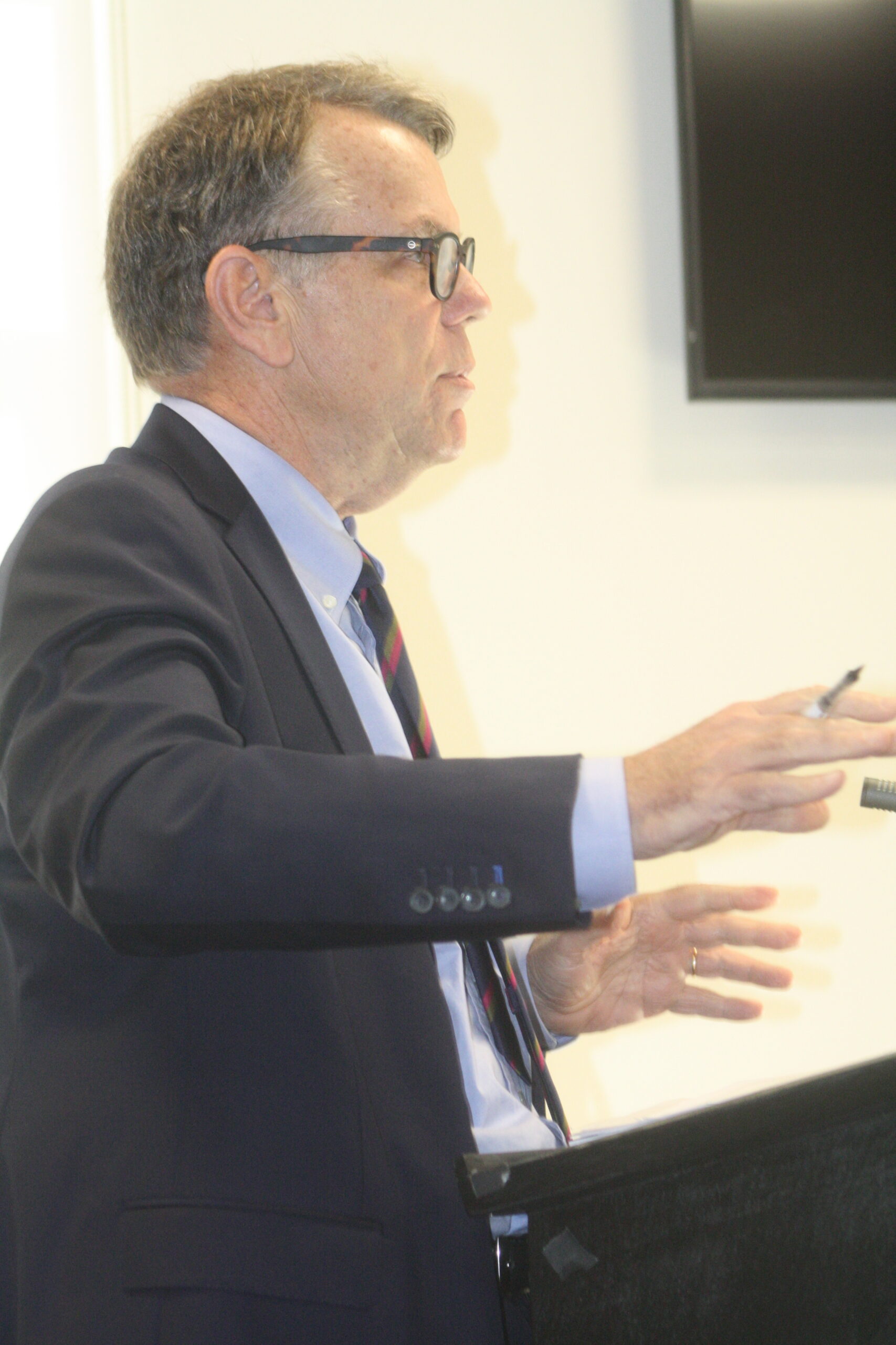 Lawyer John Bennett outlines suggested changes to the proposed rental registry law at the Southampton Village Board meeting on Tuesday night. CAILIN RILEY