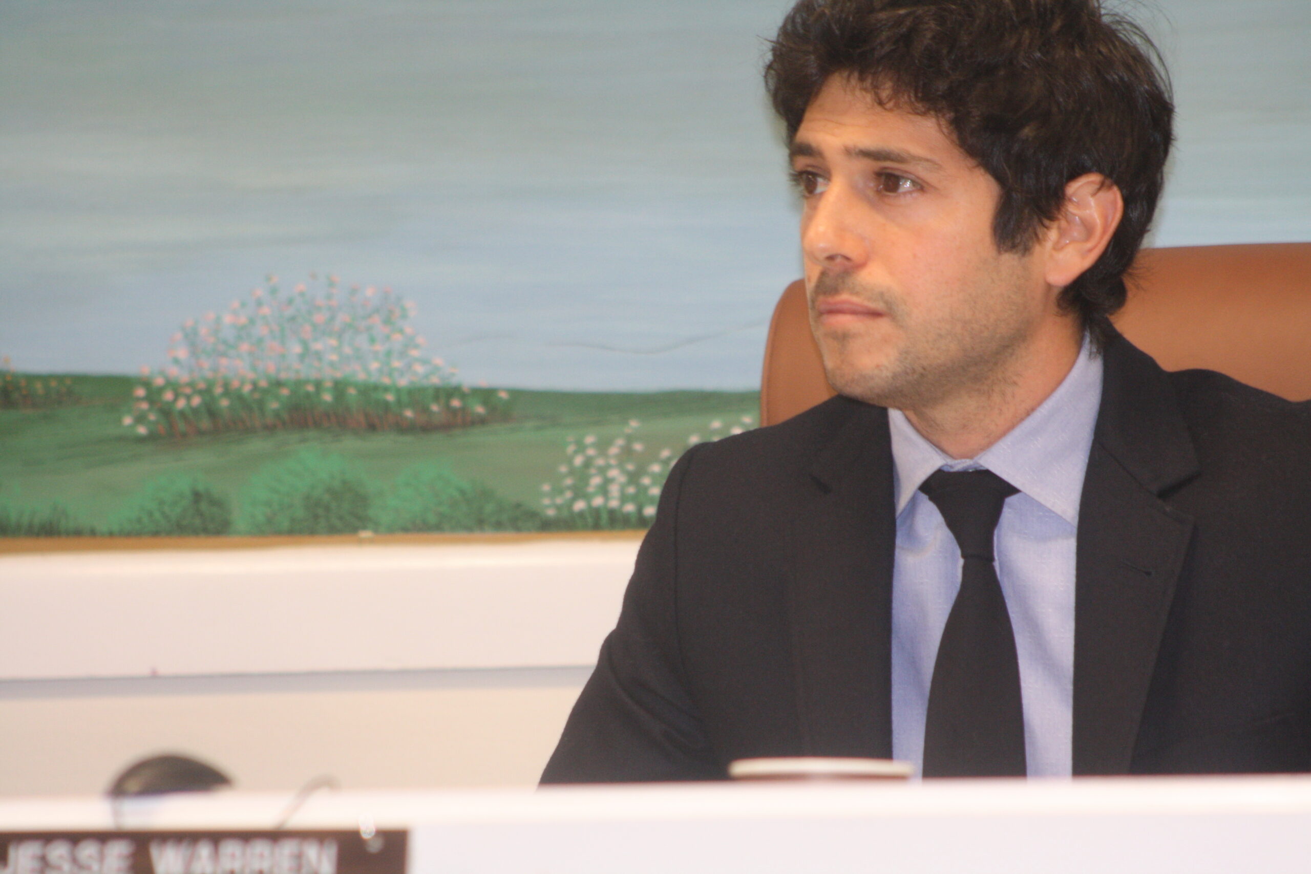 Southampton Village Mayor Jesse Warren listens to residents who came out to Tuesday night's public hearing on the proposed rental registry law with questions and concerns. CAILIN RILEY