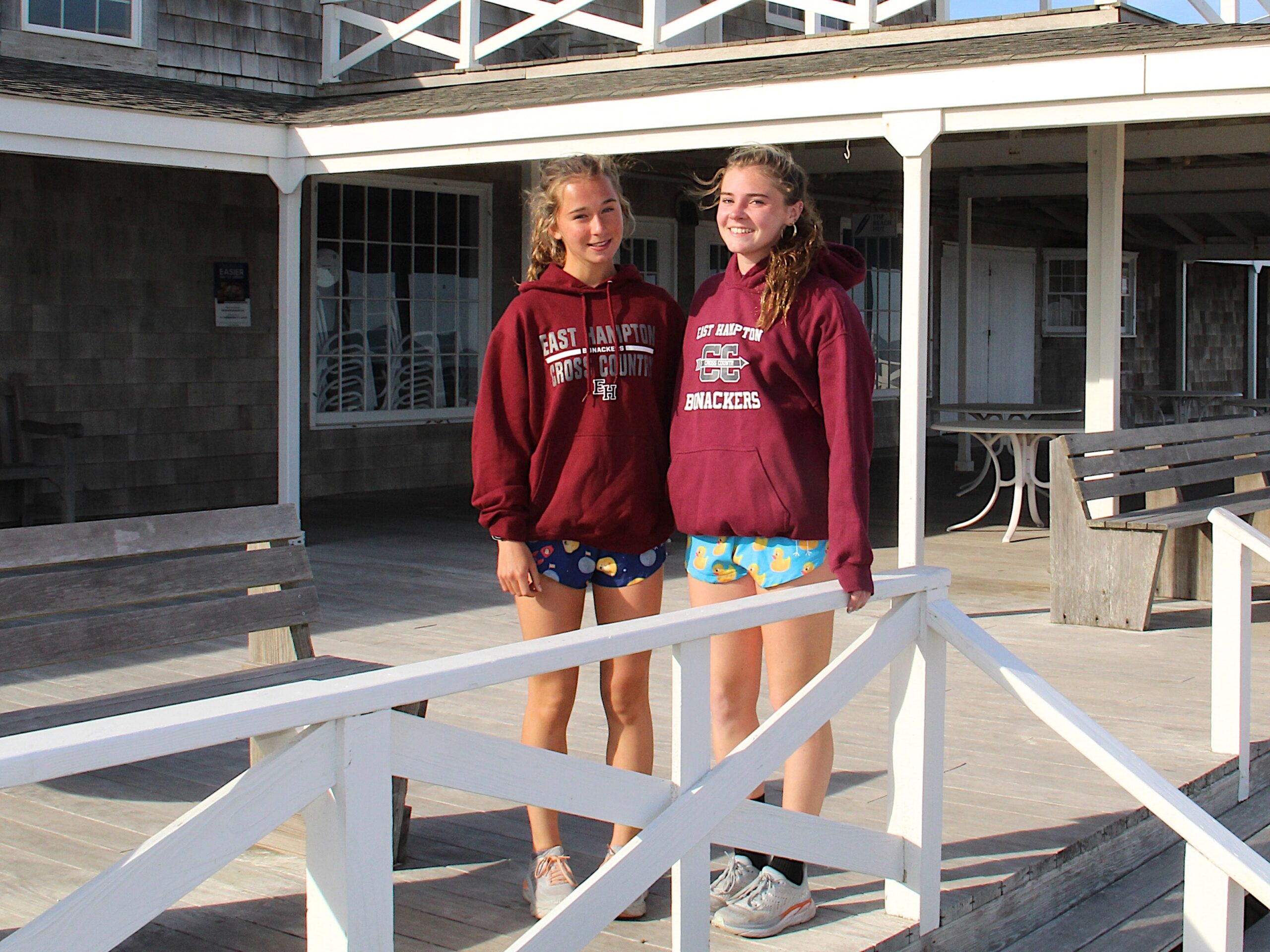 Dylan Cashin, left, and Ryleigh O'Donnell at the Main Beach pavilion in East Hampton where the start and finish of their OMAC May Day 5K will be this Sunday, May 1.    KYRIL BROMLEY