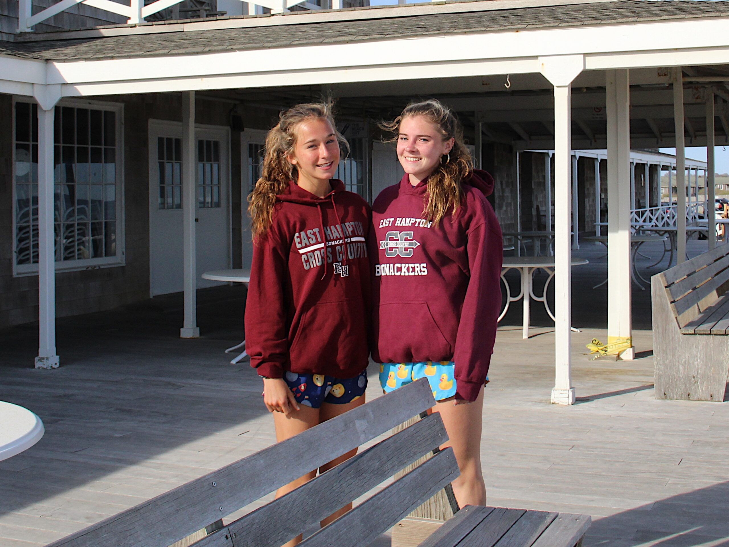 Dylan Cashin, left, and Ryleigh O'Donnell at the Main Beach pavilion in East Hampton where the start and finish of their OMAC May Day 5K will be this Sunday, May 1.    KYRIL BROMLEY