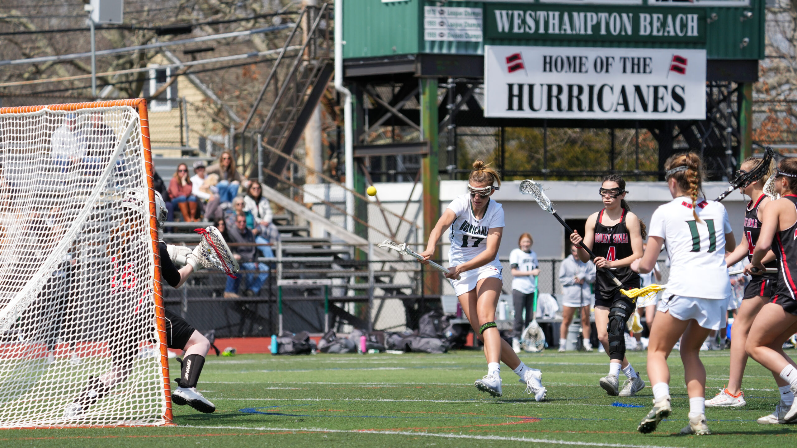 Freshman Reese King takes a shot as she races toward Mt. Siani's goal. RON ESPOSITO