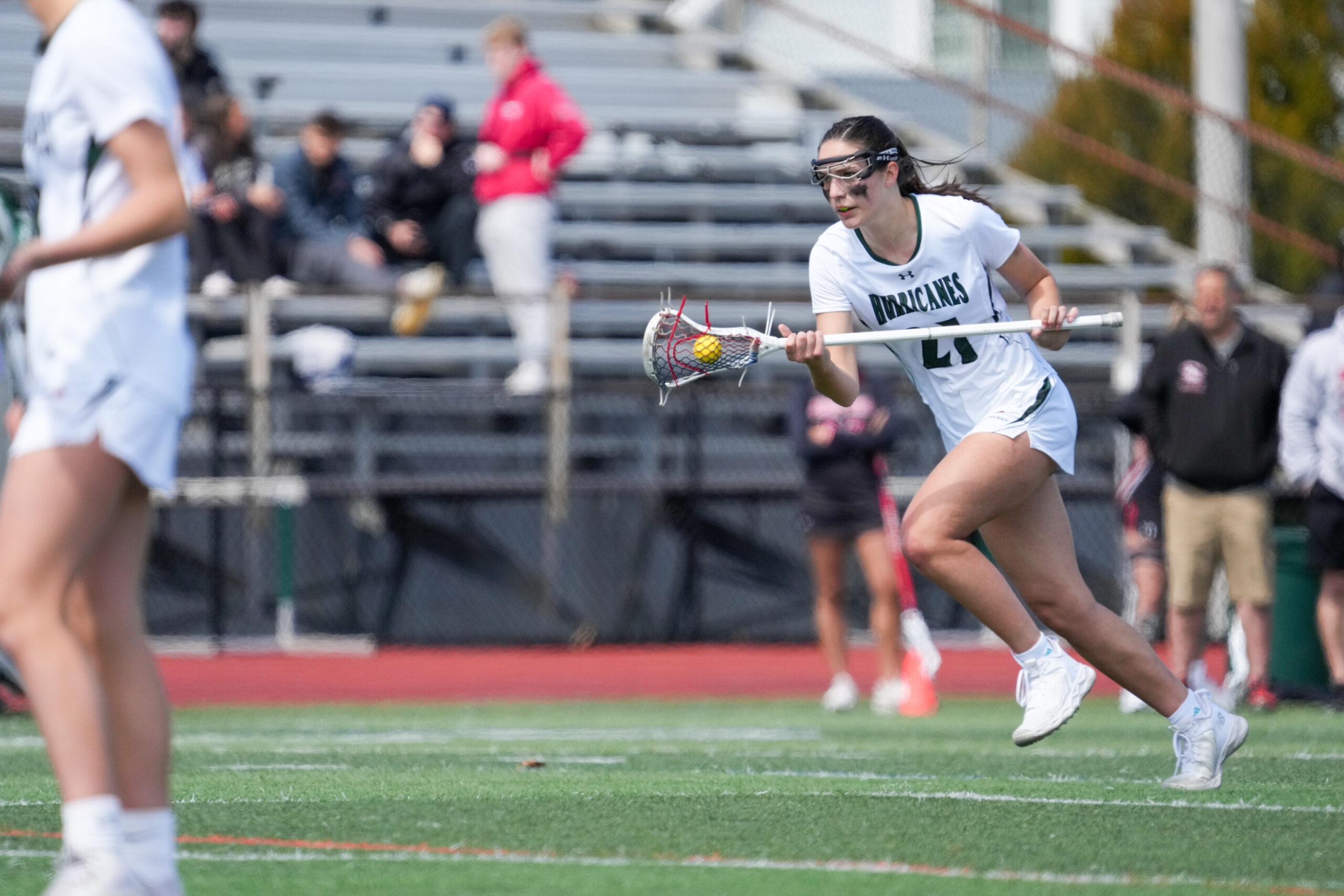 Junior defender and midfielder Reilly Mahon carries the ball into the Hurricanes' zone. RON ESPOSITO