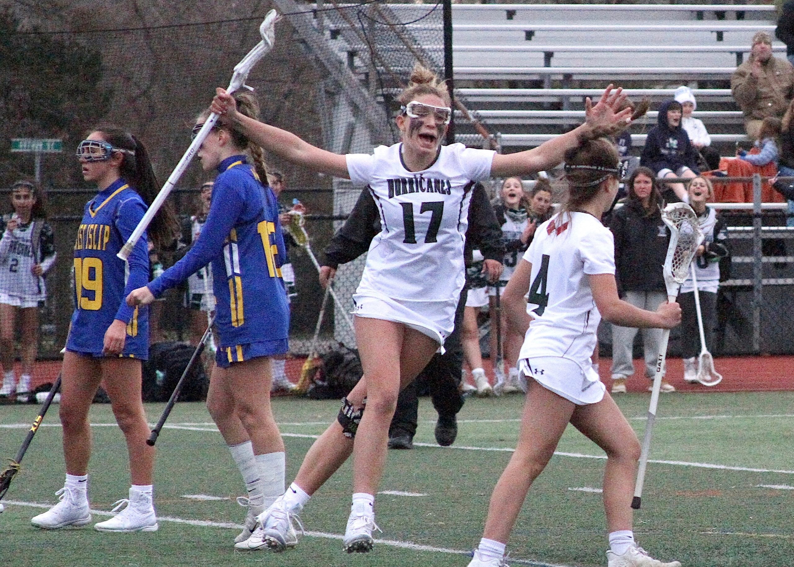 Westhampton Beach's Reese King celebrates a good goal by Brie Provenzano off a feed from Olivia Rongo to give the Hurricanes a two-goal cushion with 1:34 left to play. DESIRÉE KEEGAN