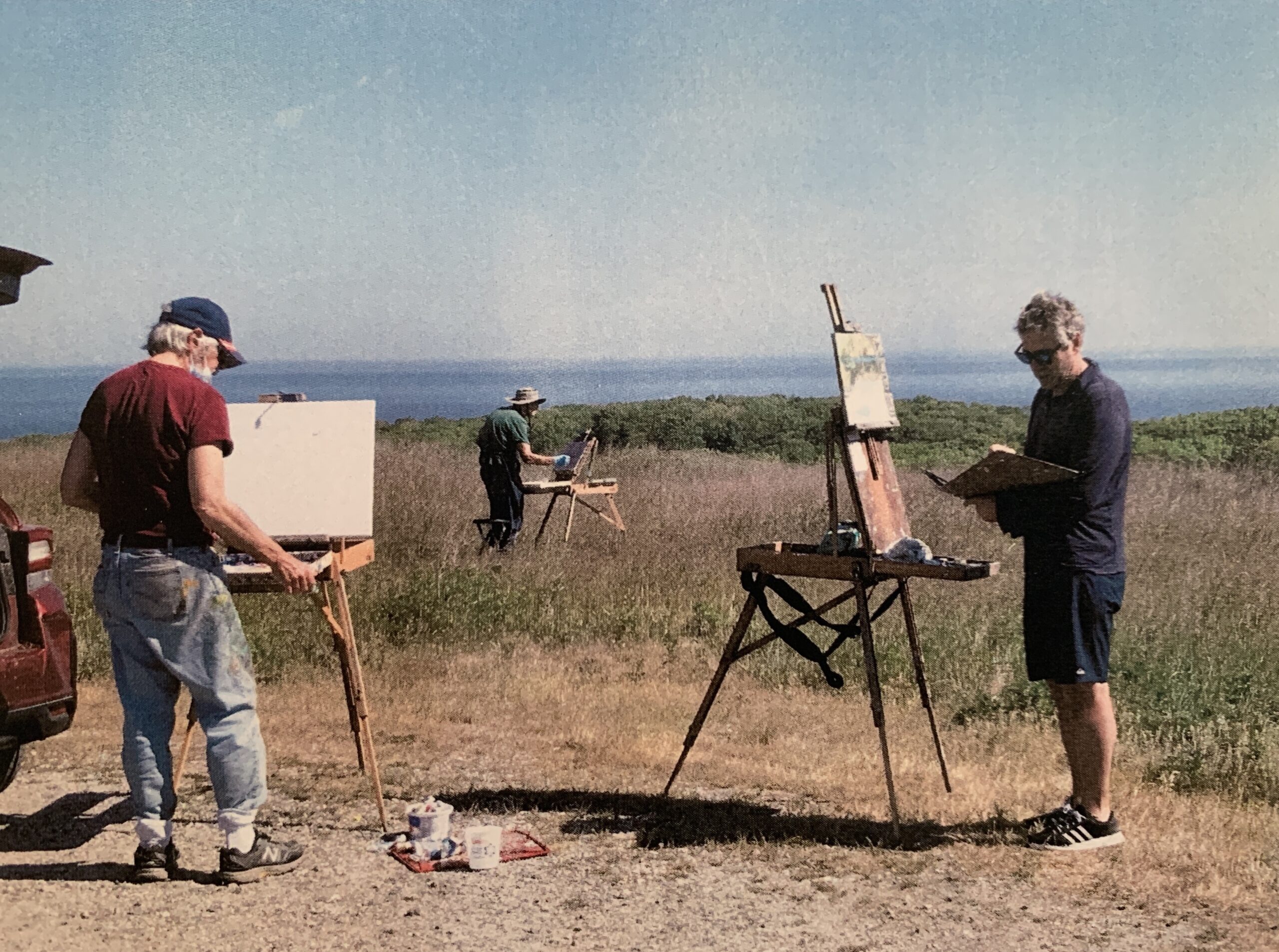 Some of The Wednesday Group's members working en plein air. COURTESY THE WEDNESDAY GROUP