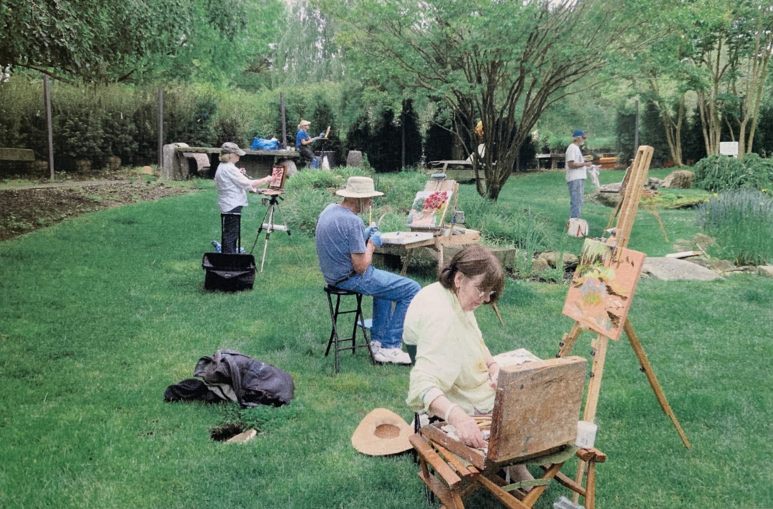 Some of The Wednesday Group's members working en plein air. COURTESY THE WEDNESDAY GROUP