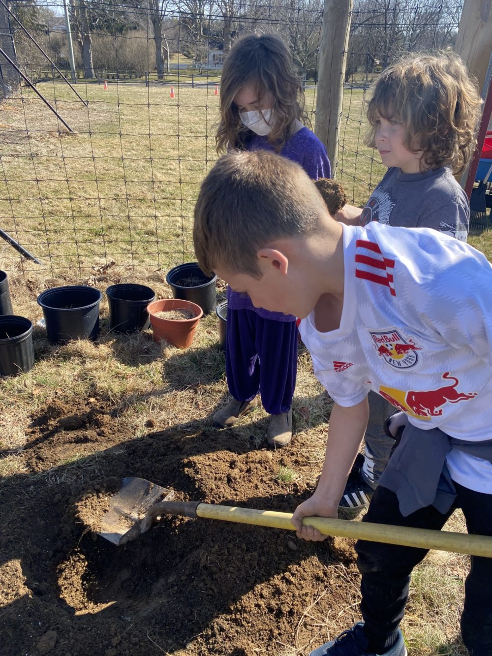 Hayground School children learn about the native soil of Bridgehampton.  ANNA ROMER