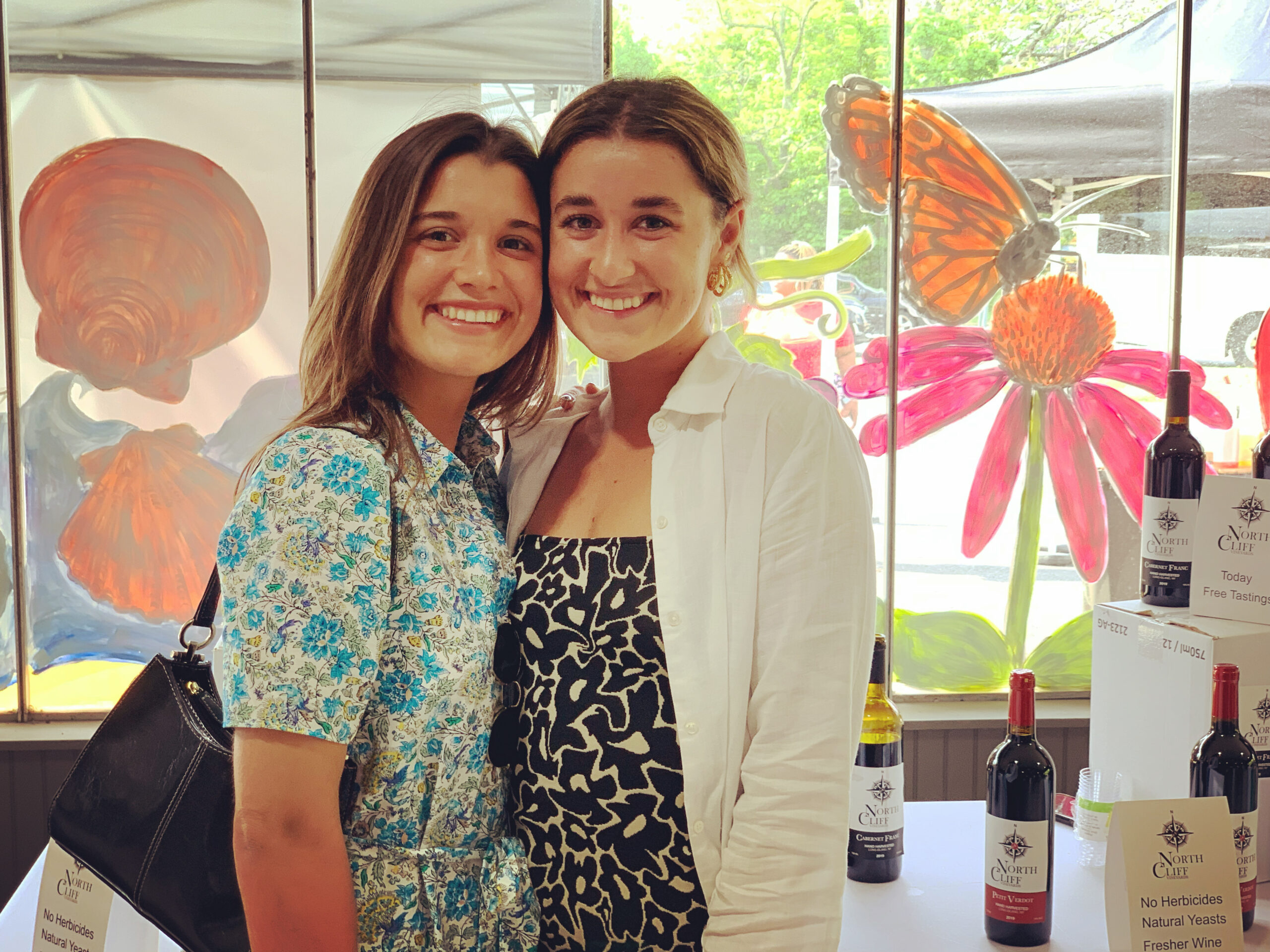 Southold sisters Winter and Willow Wilcenski shopped at the market recently. COURTESY STACYDERMONT.COM