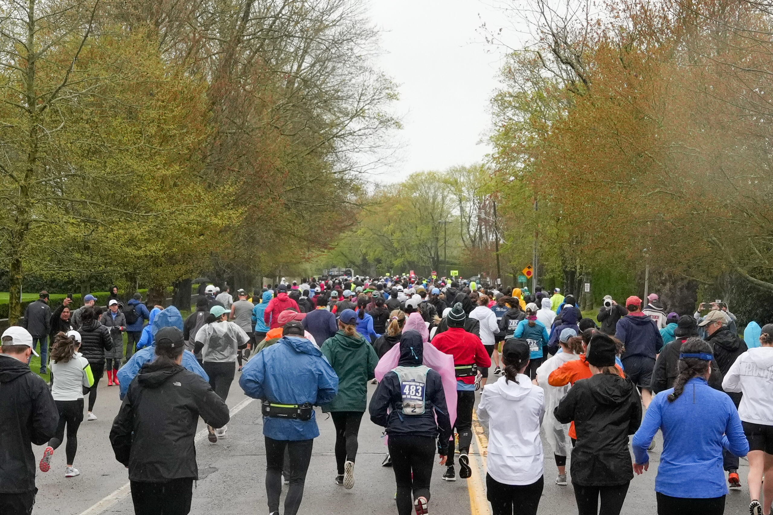 Runners start the seventh annual Bridgehampton Half-Marathon amid rainy and windy conditions on Saturday.  RON ESPOSITO