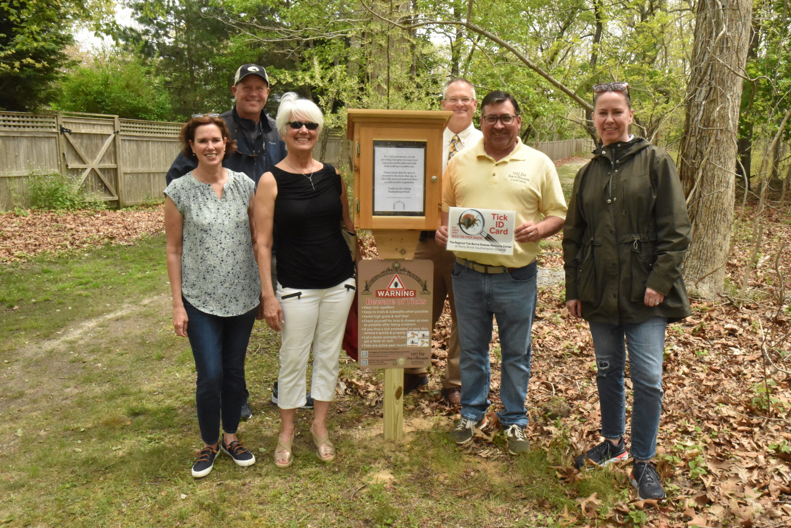 Mashashimuet Park board member Nancy Benvent; park manager Jeff Robinson; Rebecca Young of Stony Brook Southampton Hospital's Regional Tick-Borne Disease Resource Center; Scott Campbell, laboratory chief of Suffolk County's Arthropod-Borne Disease Laboratory; Brian Kelly of East End Tick and Mosquito Control and park board member Rachel Dee gathered in the park to unveil a tick awareness kiosk on Saturday, May 14.
