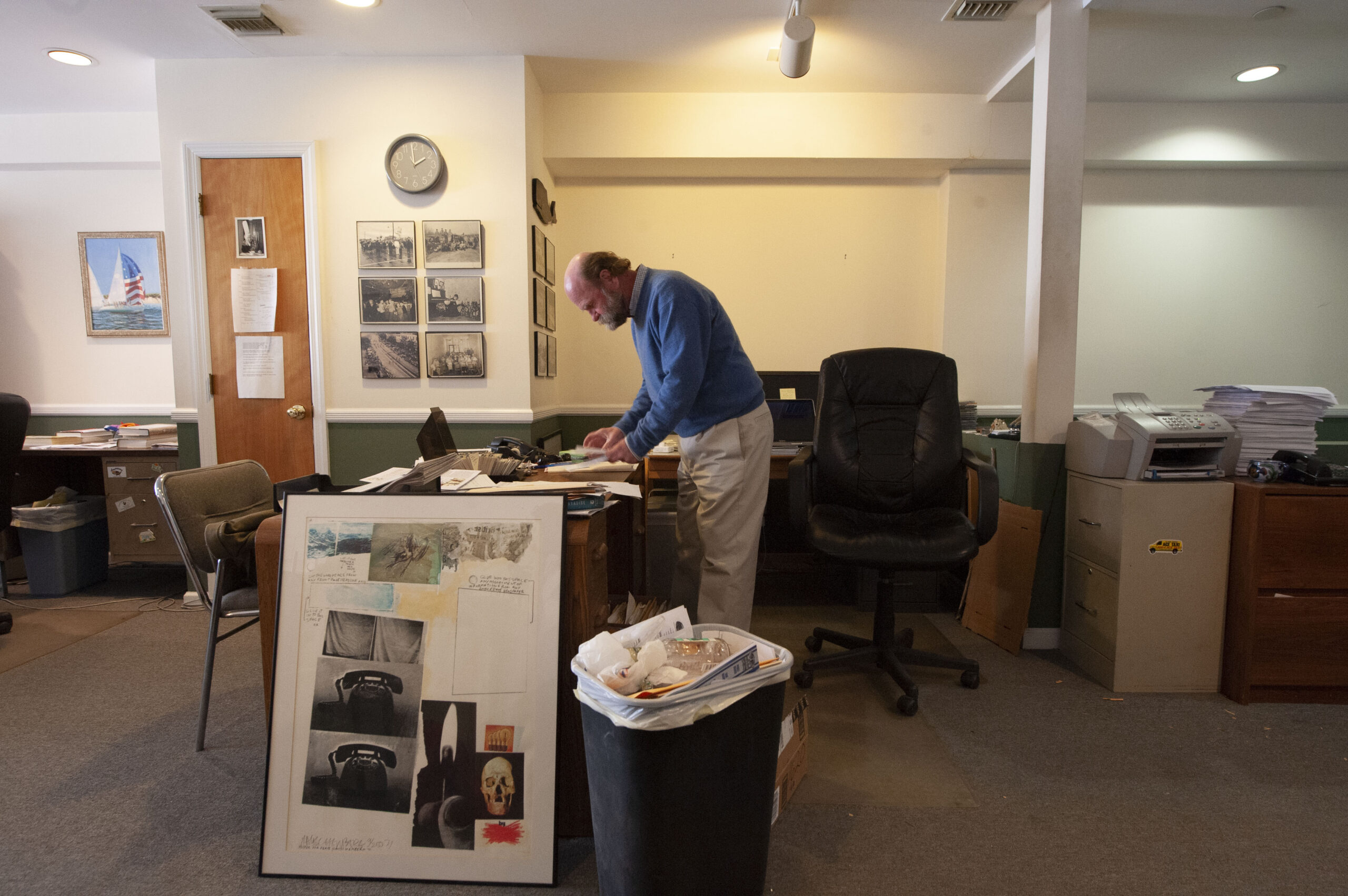 Bryan Boyhan at work in the Sag harbor Express office in 2014.   MICHAEL HELLER