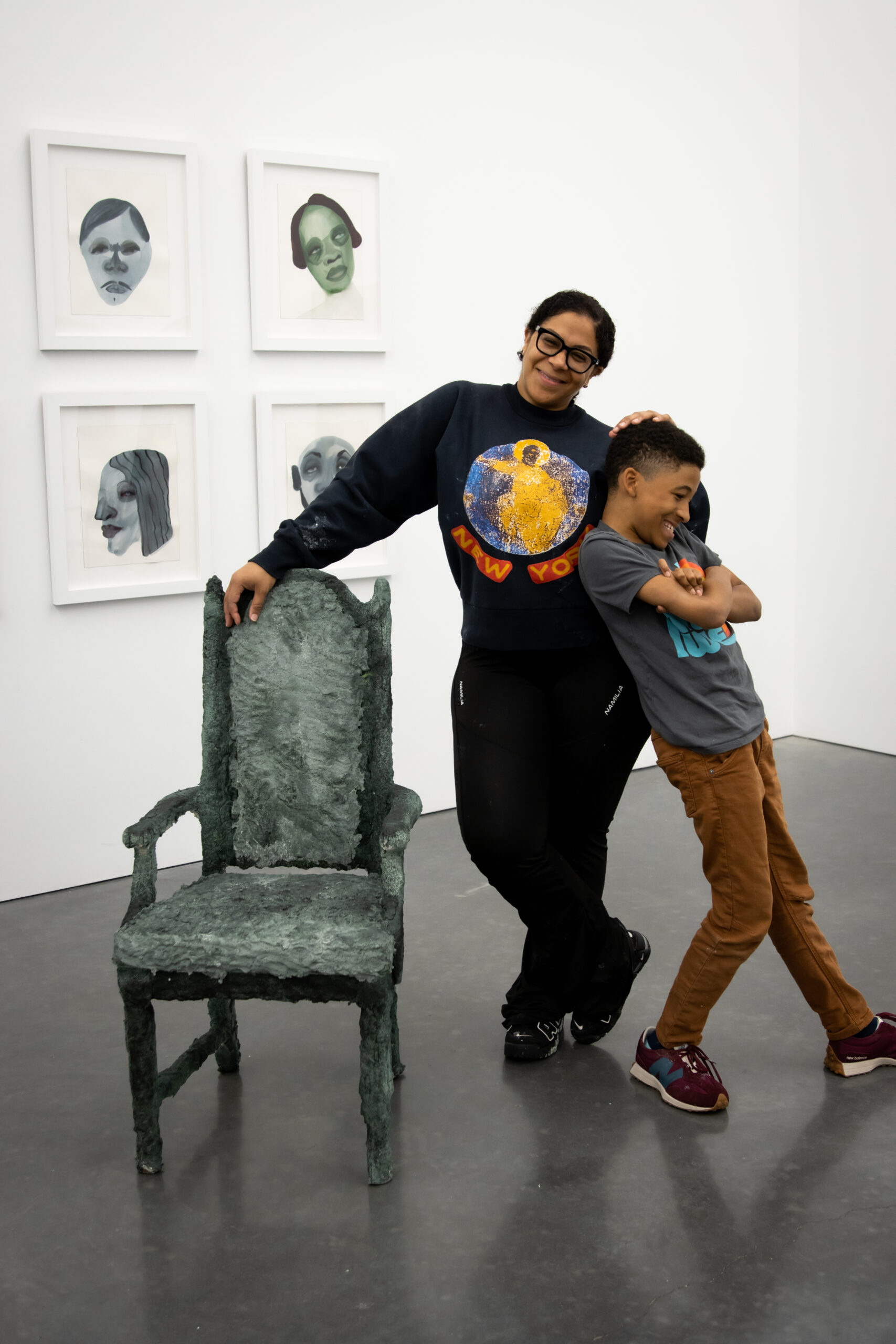 February James with her son, Greyson, during the installation of her piece 