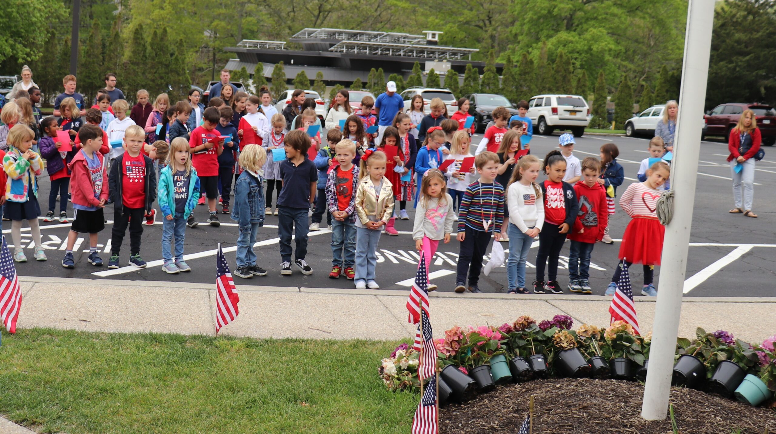 Students and staff at Raynor Country Day School hosted an Armed Forces Day Celebration on Friday, May 20. COURTESY RAYNOR COUNTRY DAY SCHOOL