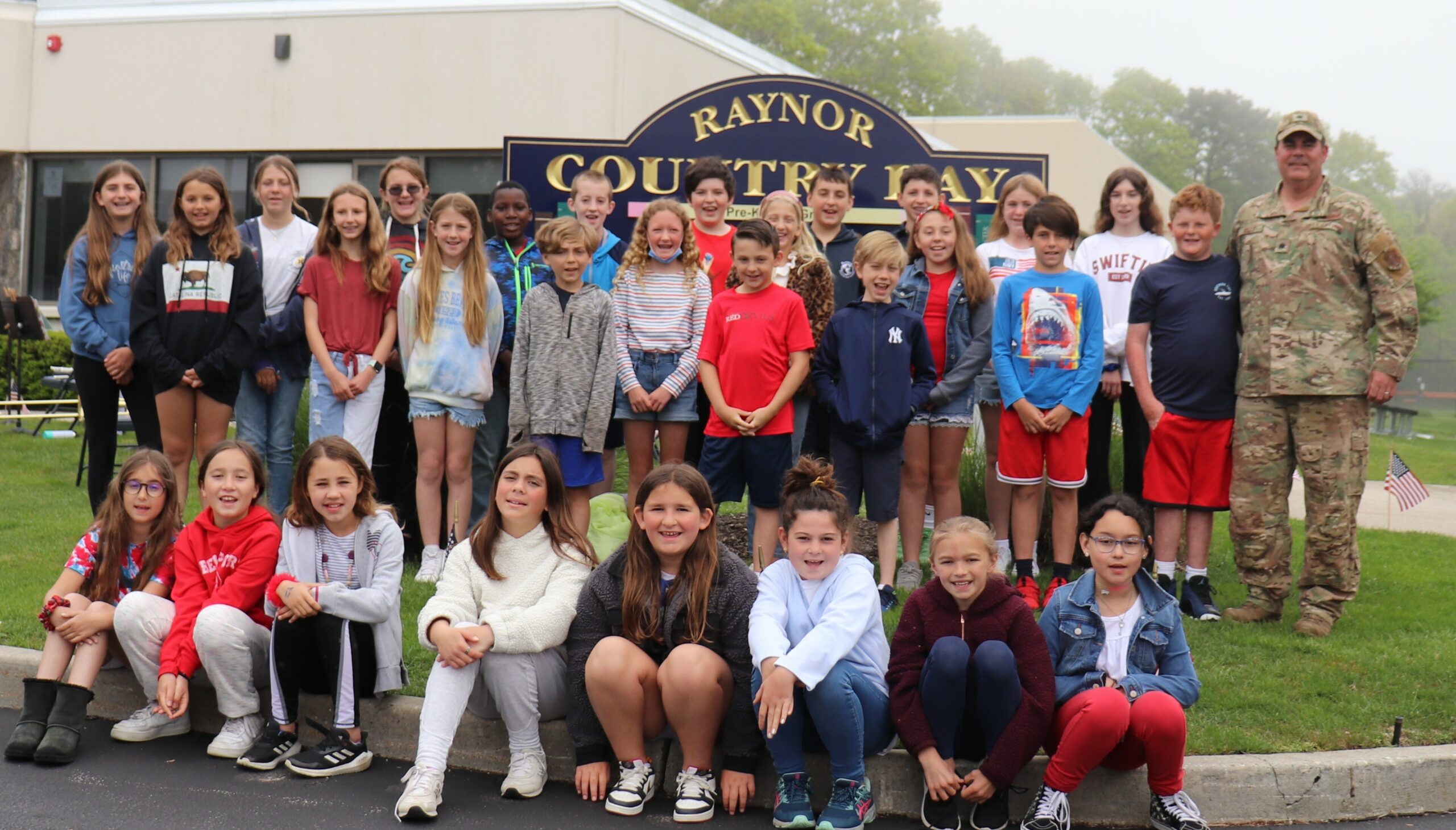 Students and staff at Raynor Country Day School hosted an Armed Forces Day Celebration on Friday, May 20. COURTESY RAYNOR COUNTRY DAY SCHOOL