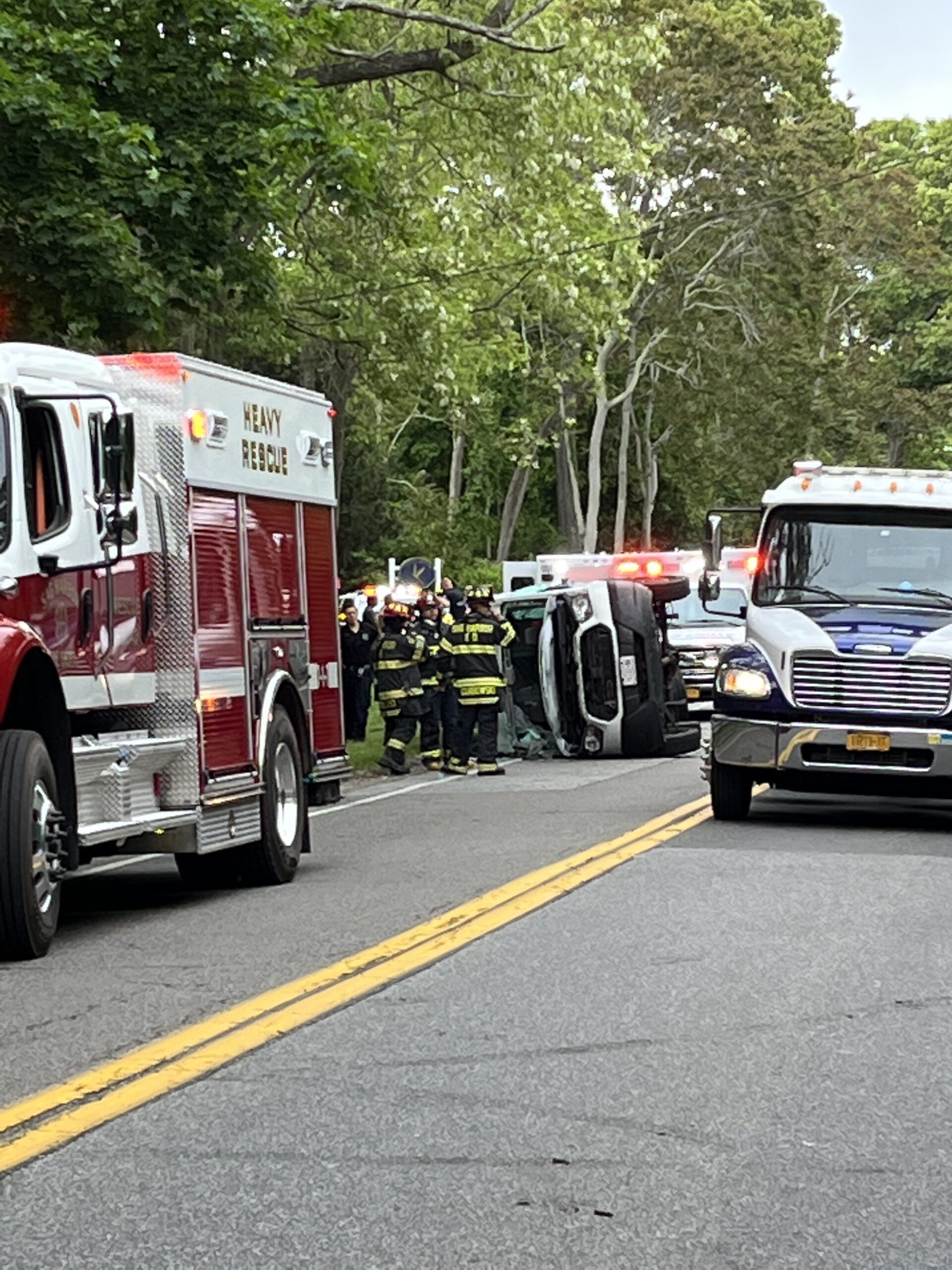 A van overturned in a three-vehicle crash on Noyac Road Friday afternoon.
