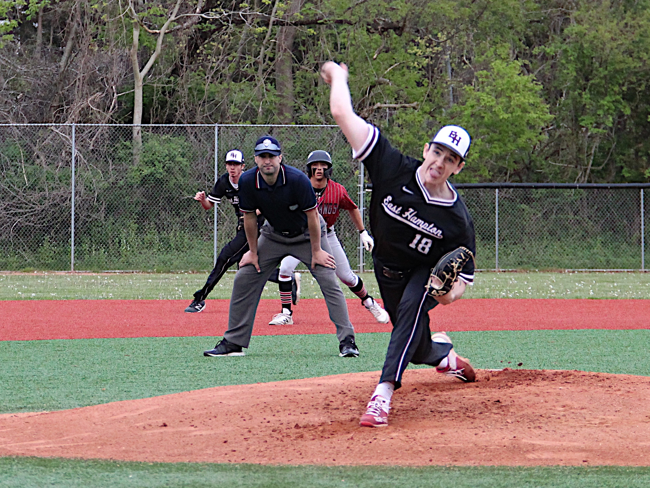 East Hampton senior Colin Ruddy started on the mound in his final home game on May 11.   KYRIL BROMLEY