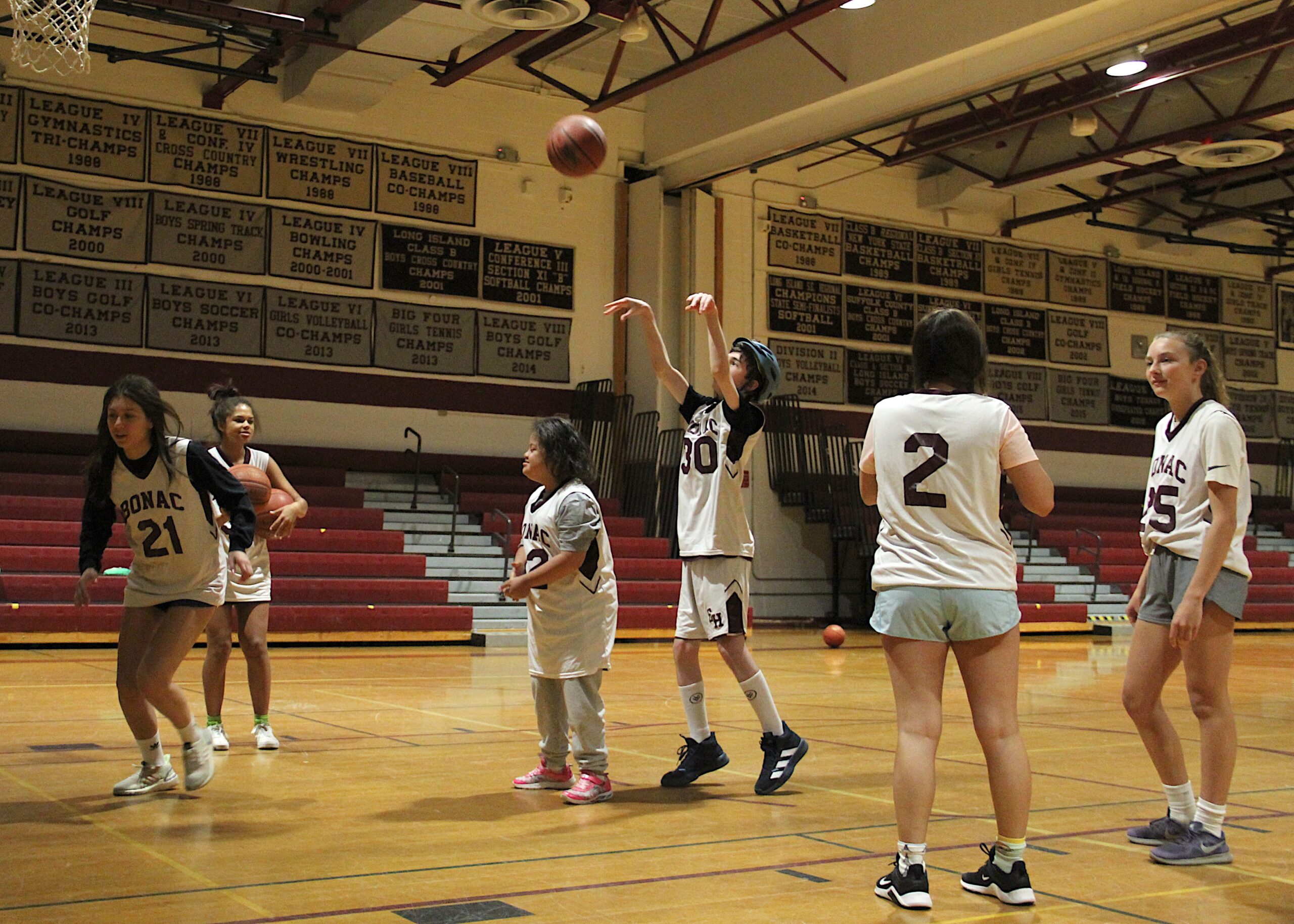 Liam Baum (30) and the rest of the Bonackers practice prior to their game against Patchogue-Medford on Monday.   KYRIL BROMLEY