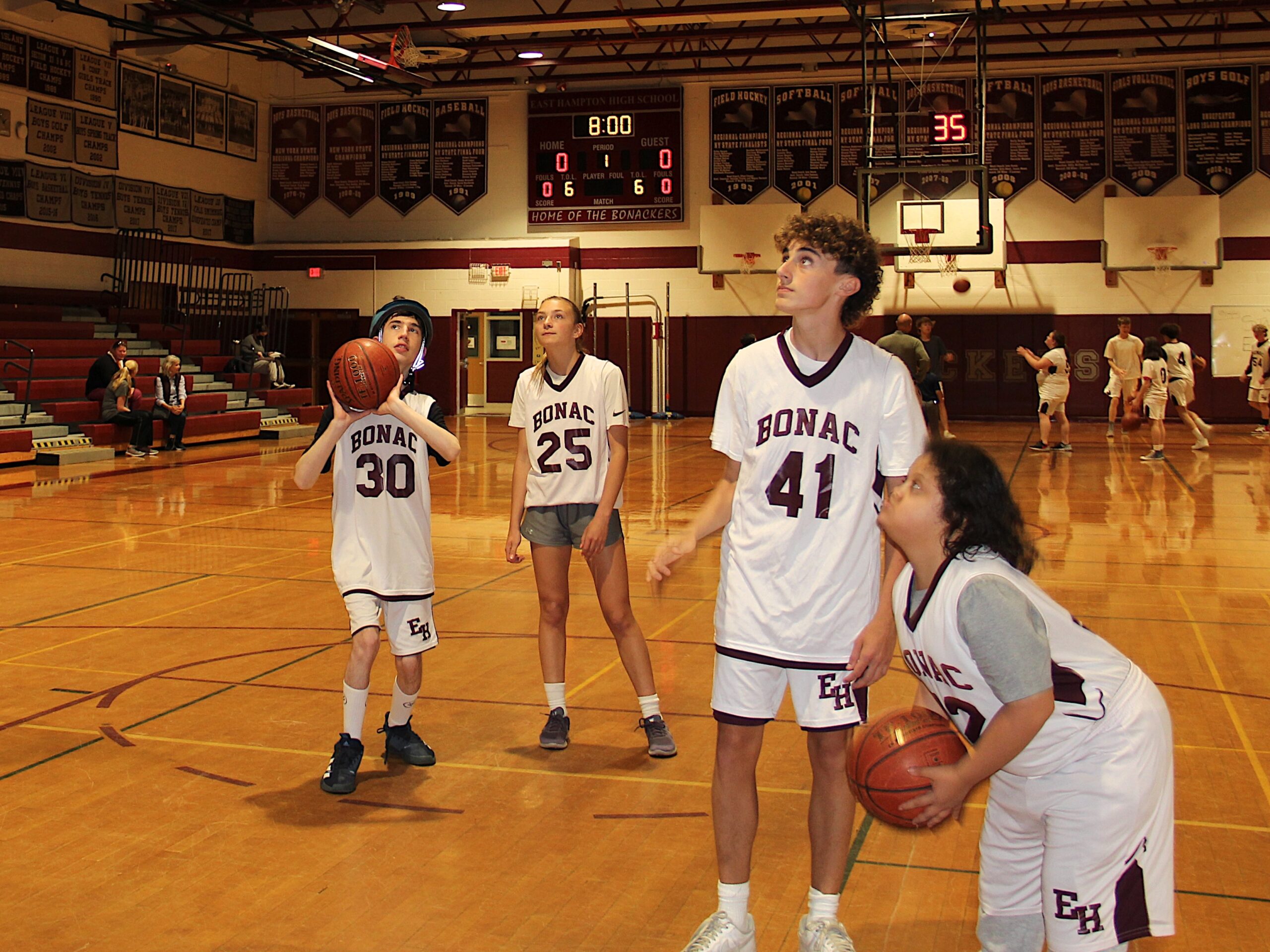 Lola Garneau (25) assists Liam Baum (30) while Alex Hatgistavrou 41) assists Nicole Verdugo.   KYRIL BROMLEY