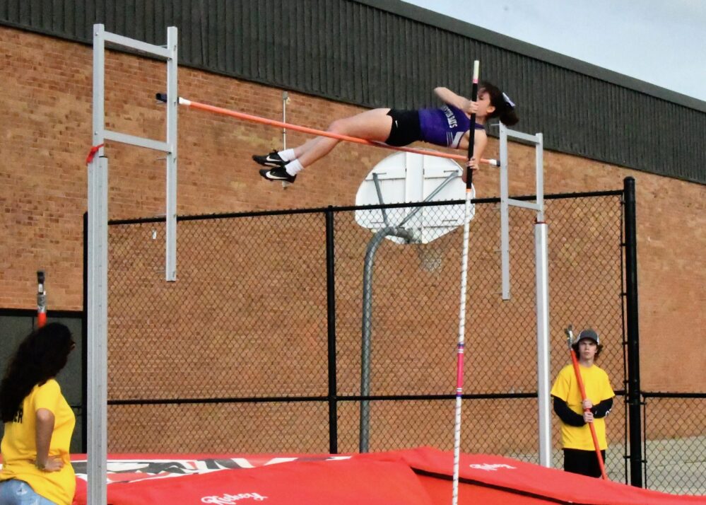 Junior Maizie Poulakis earned first place in the pole vault at the Suffolk County Class C championships. MICHELLE MALONE