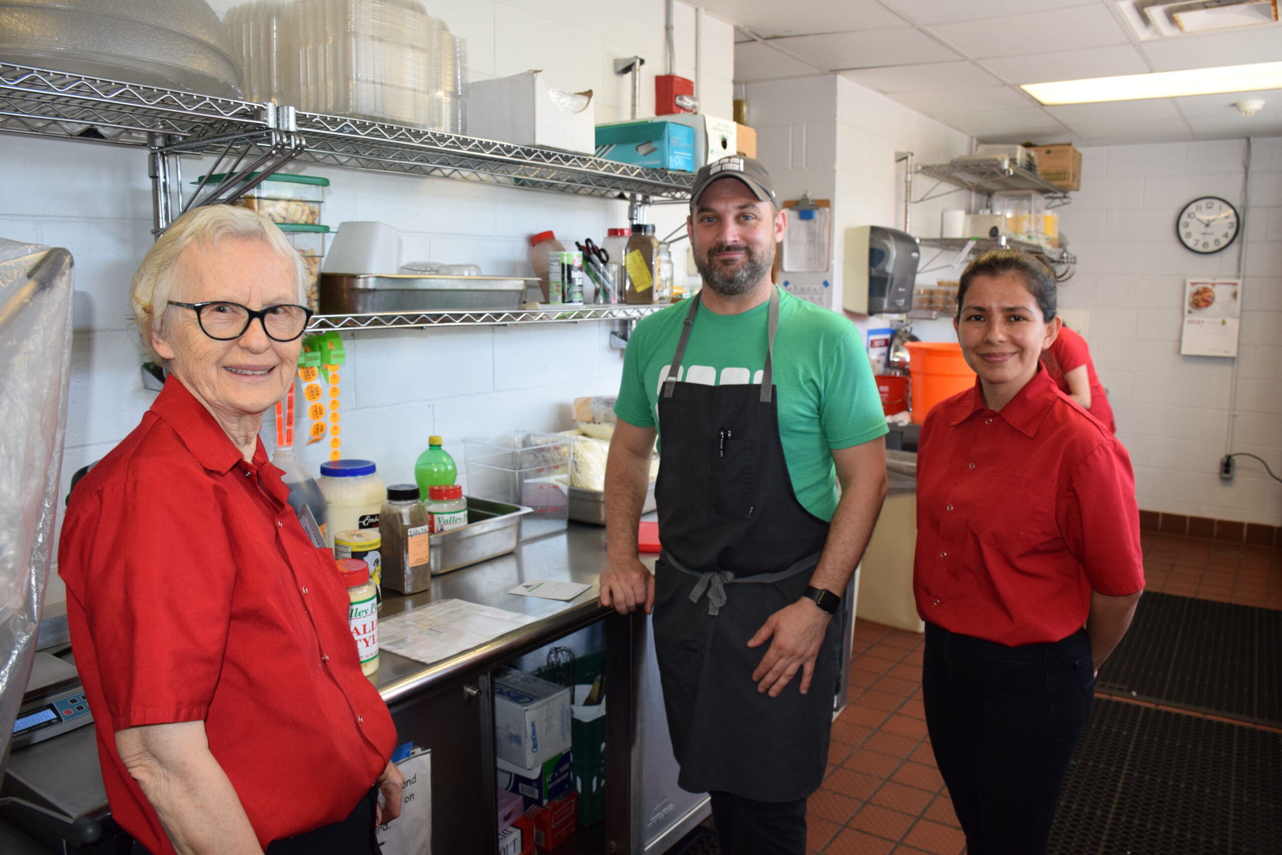 Southampton Elementary School food service staff Sully Gutierrez, left, and Ann Sorace, right,  were assisted by Chef Ryan Kennedy of Brigaid to prepare fresh dishes for students. COURTESY SOUTHAMPTON SCHOOL DISTRICT