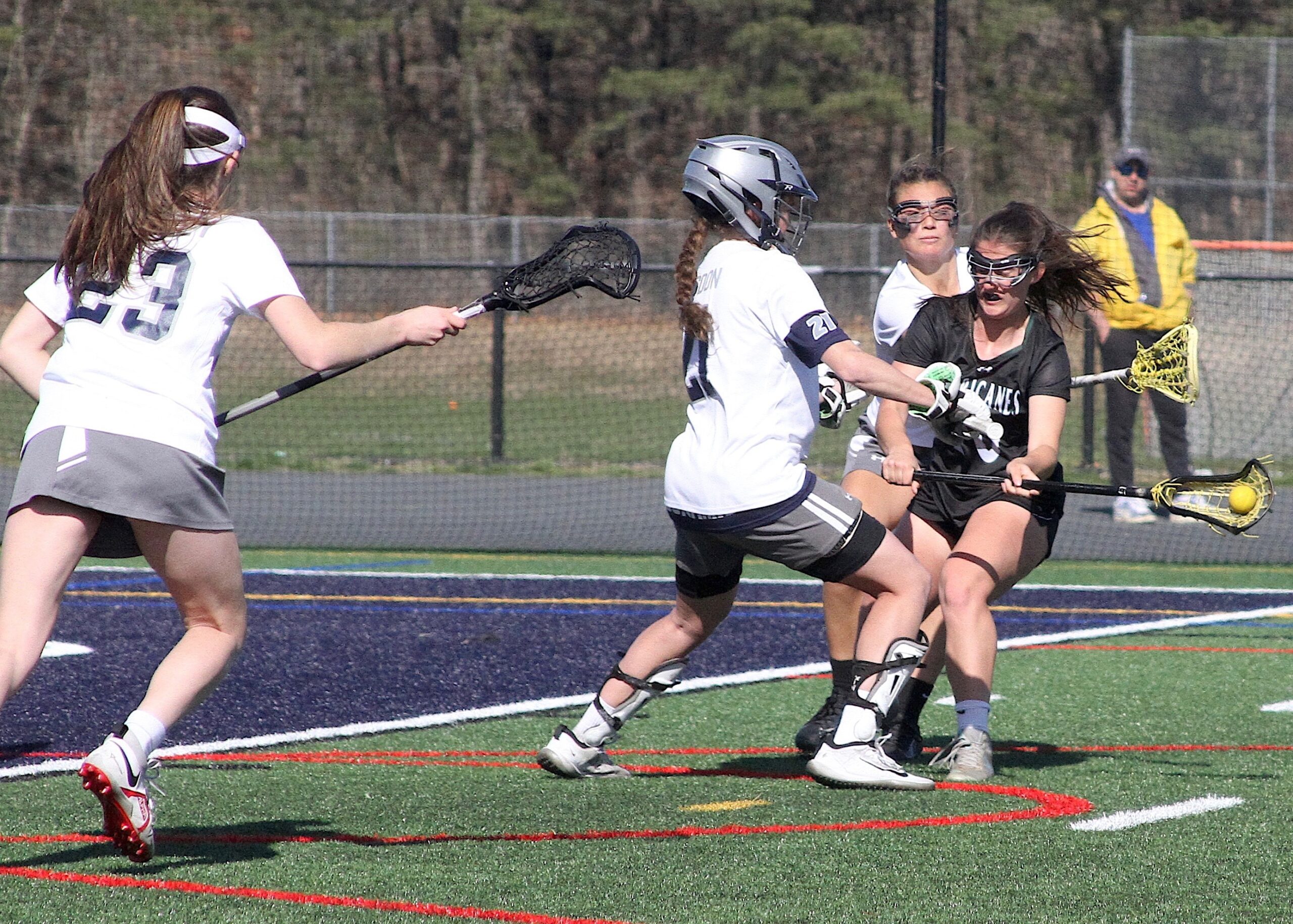 Junior attack Samantha Schaumloffel shoots and scores through the defense after Eastport-South Manor's goalie came out to challenge her. DESIRÉE KEEGAN