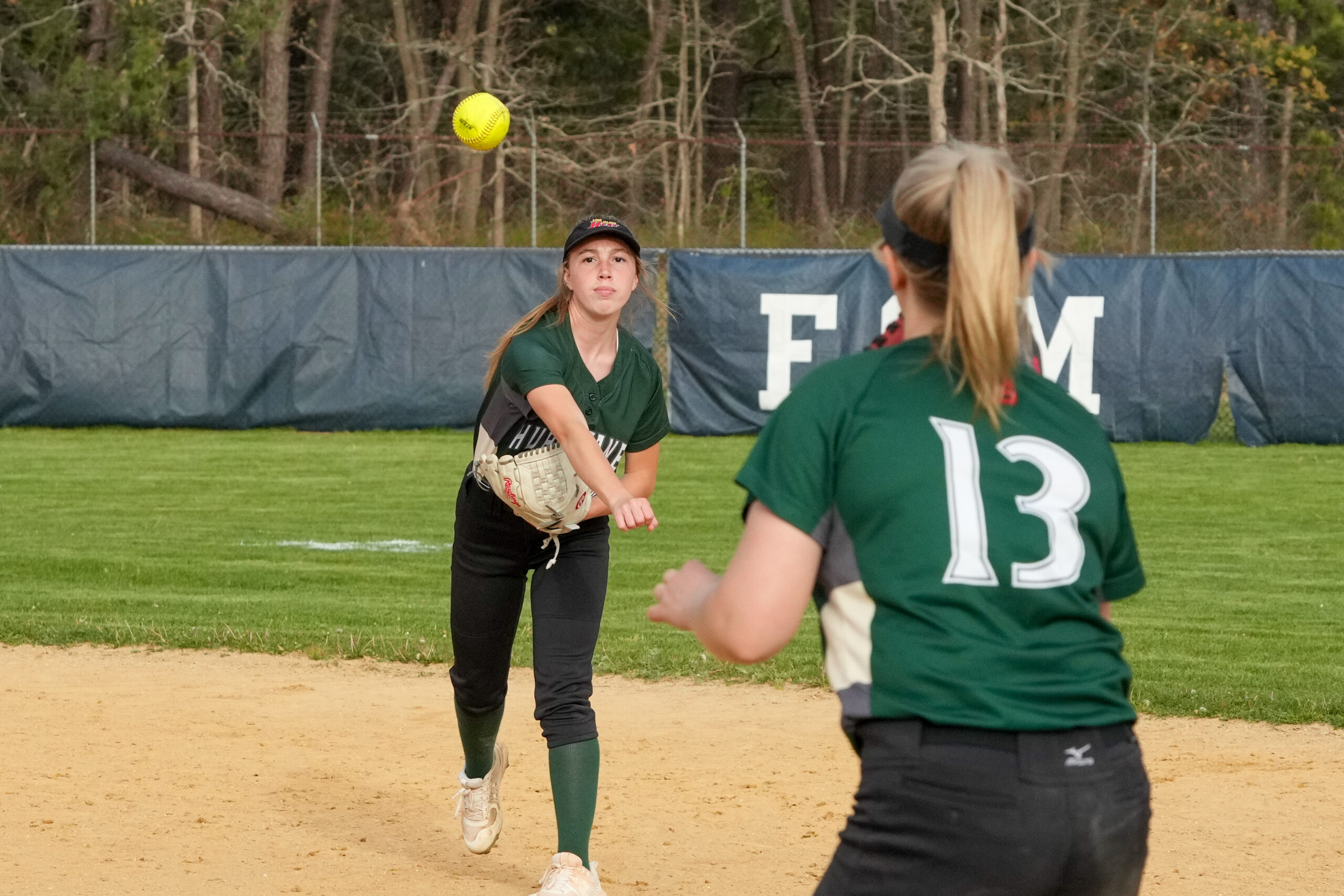 Westhampton Beach second baseman Ellie Jean Burke throws to first for an out.  RON ESPOSITO
