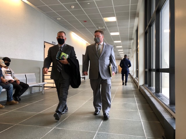 Lead defense attorney in the upcoming murder trial if Joseph Grippo of Montauk, Daniel Russo, left, leaves court with fellow attorney Keith O’Halloran after agreeing to July 18 as the first day of jury selection. T. E. McMORROW