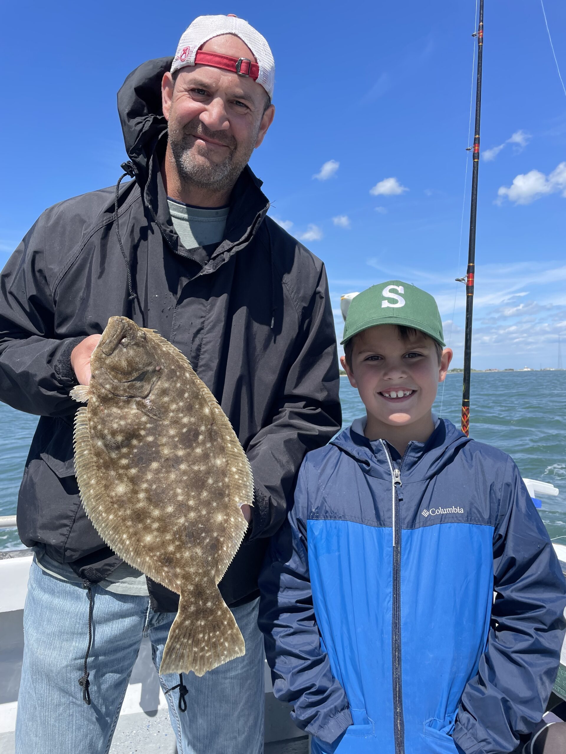 Chris and Thomas Capalbo with a keeper fluke caught aboard the Shinnecock Star last week.