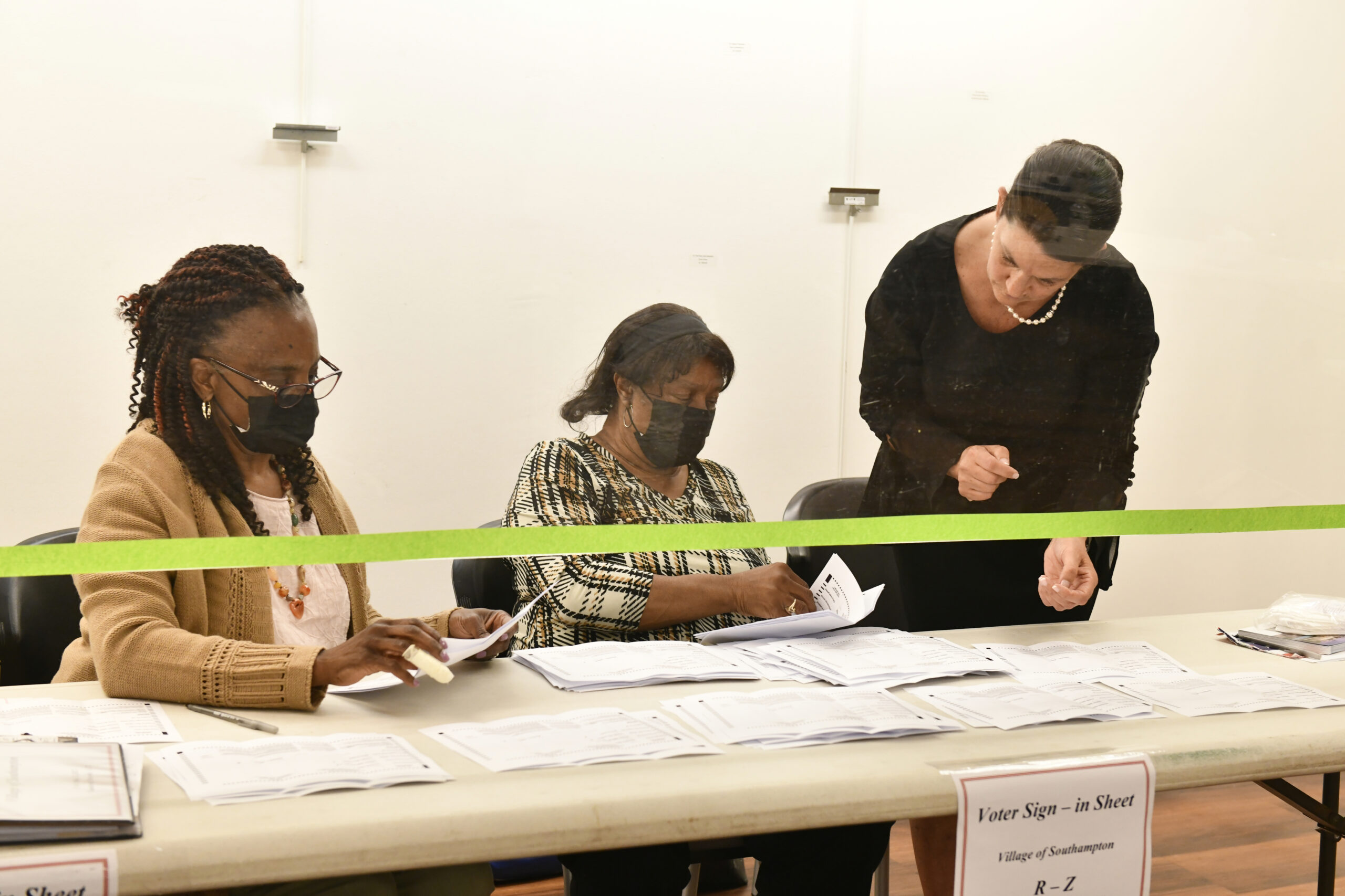 Absentee ballots are counted on election night in Southampton Village.  DANA SHAW