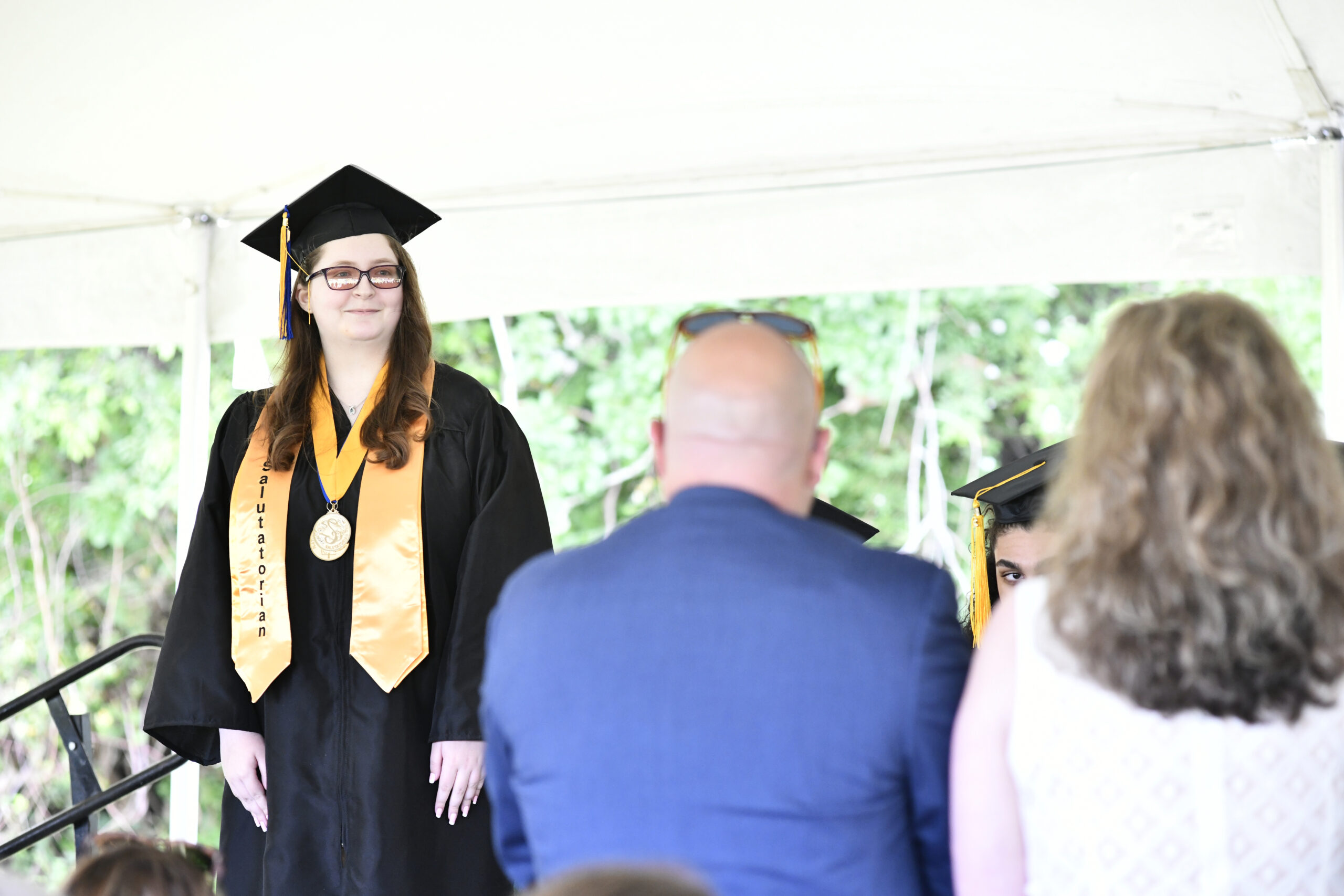Salutatorian Grace Turza faces her parents at graduation on Saturday.