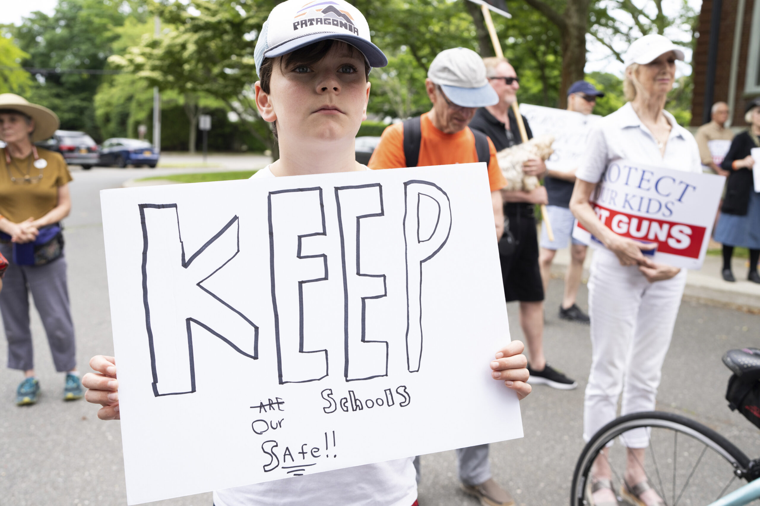 Jack Brousseau attends  the  anti-gun rally outside at the Southampton Town Hall on Saturday. Students and residents joined others around the nation in a March for Our Lives rally.     LORI HAWKINS