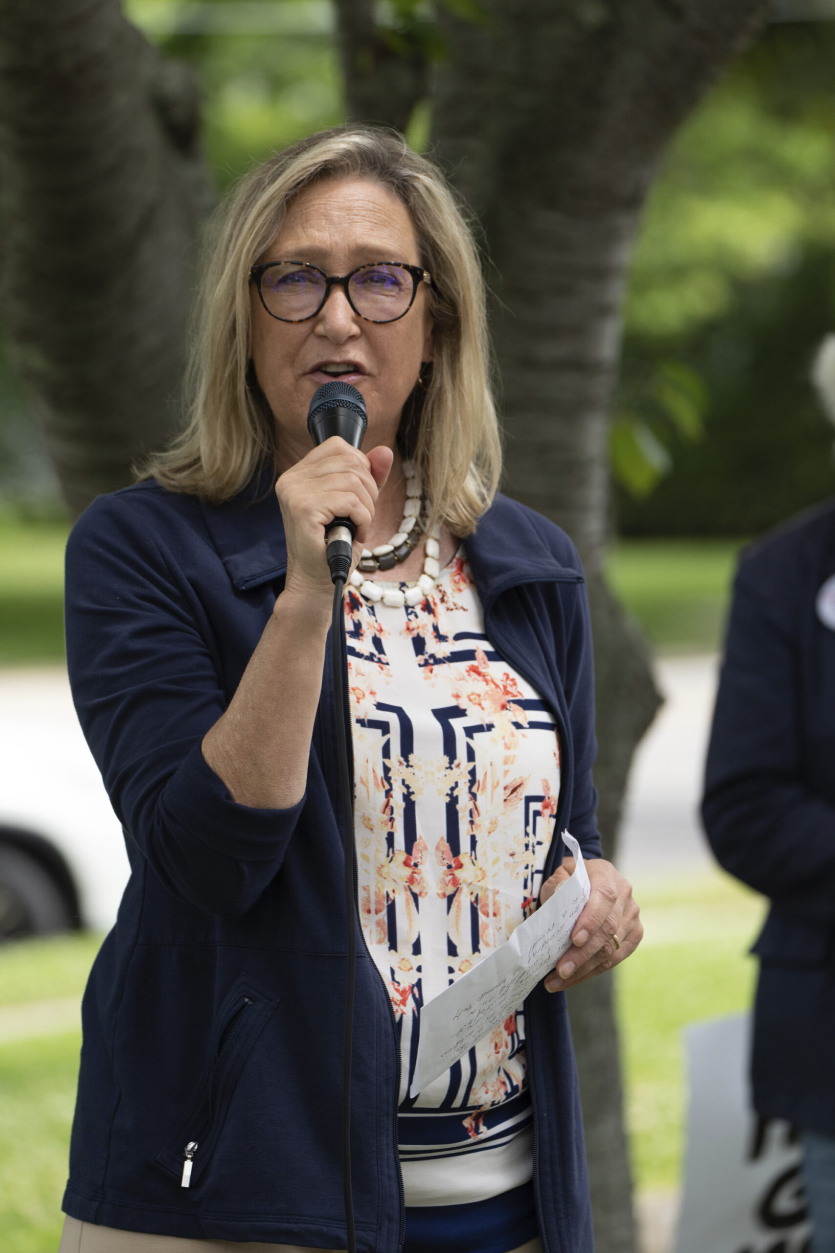 Suffolk County Legislator Bridget Fleming speaks at the  anti-gun rally outside at the Southampton Town Hall on Saturday.  LORI HAWKINS