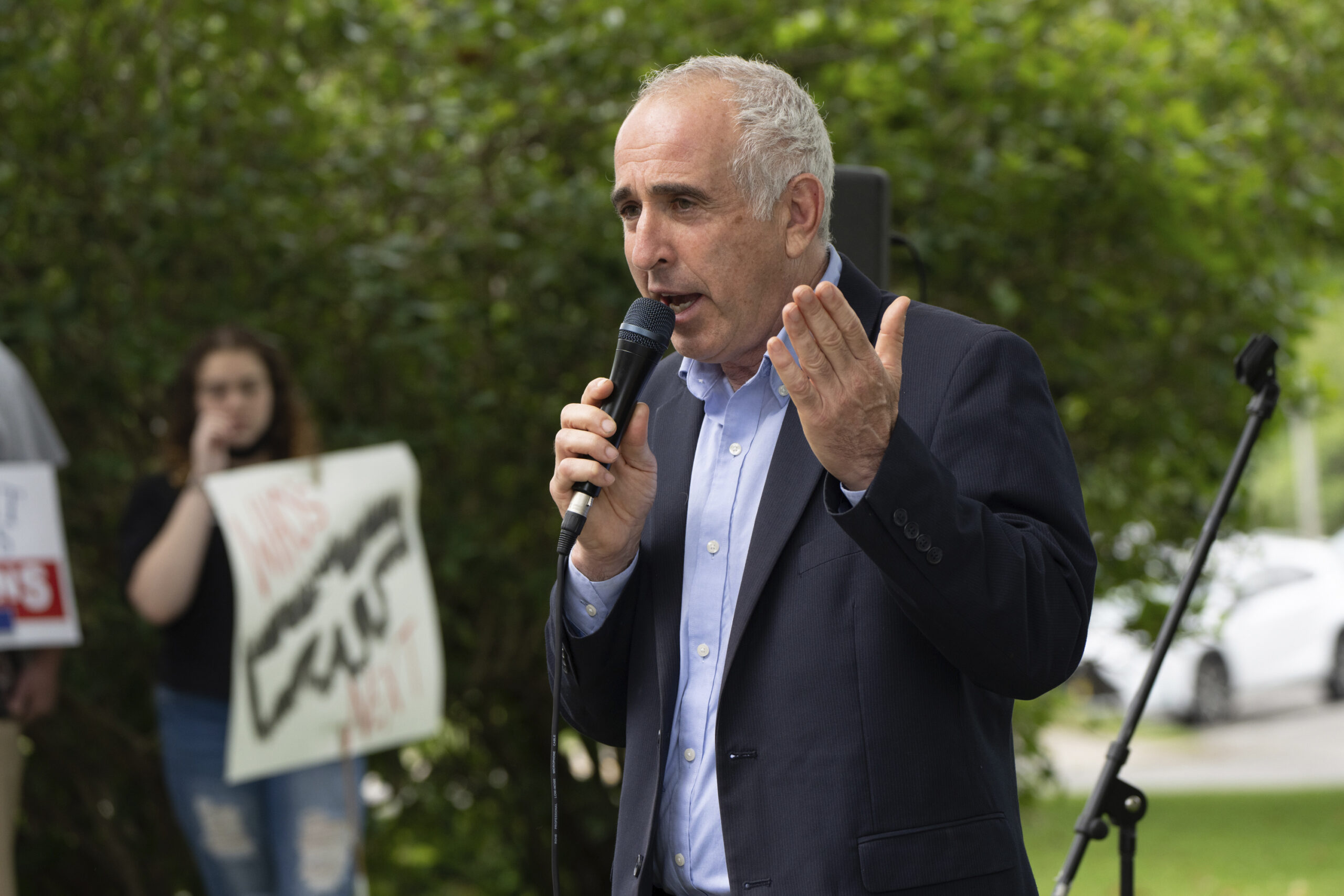 Southampton Town Supervisor Jay Schneiderman speaks at the  anti-gun rally outside at the Southampton Town Hall on Saturday.   LORI HAWKINS