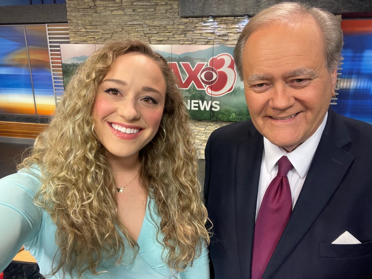 Drew Scott, right, and Christina Guessferd at WCAX in Vermont, where he works as the weekend anchor.