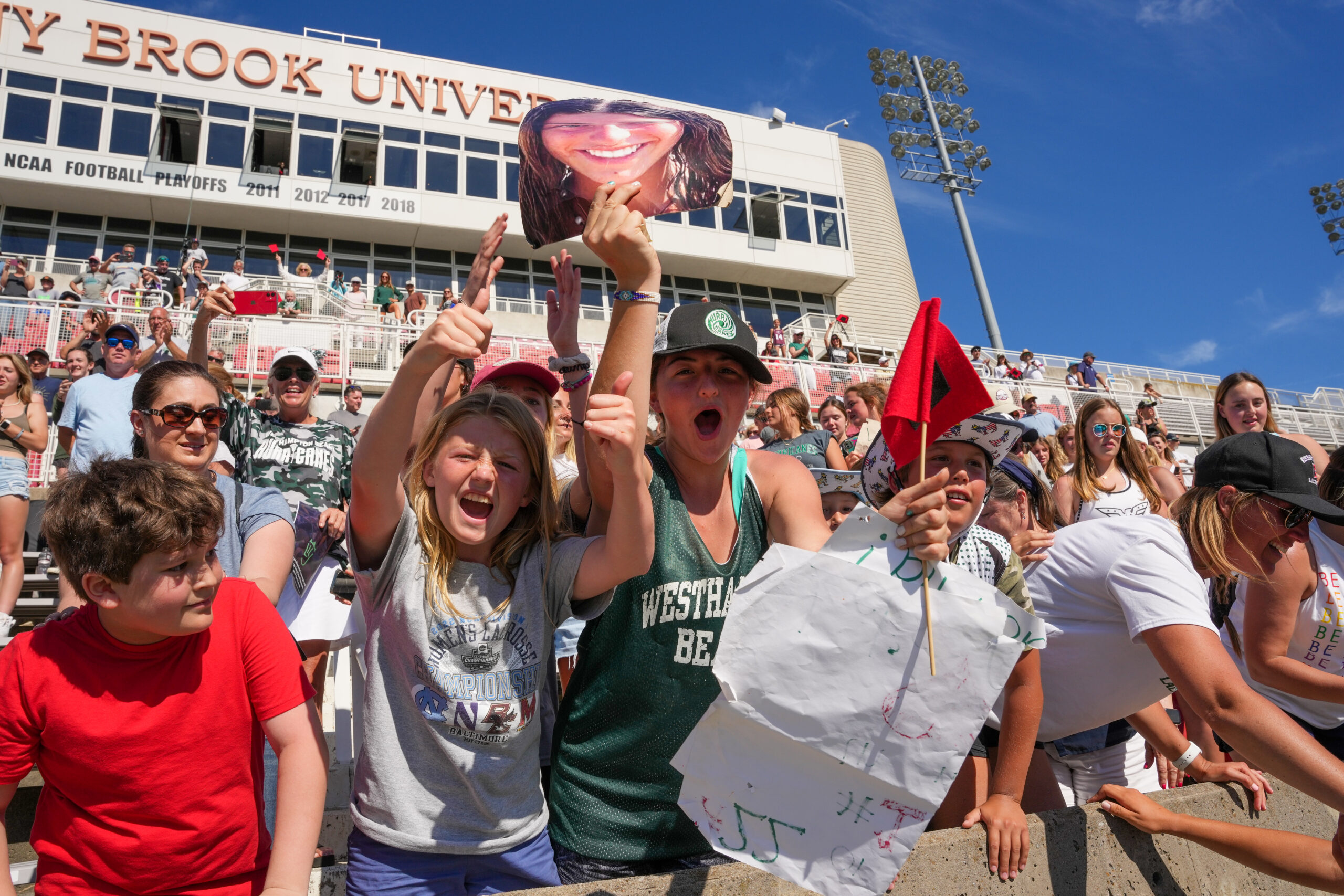 Young fans cheer on the Westhampton Beach girls lacrosse team. RON ESPOSITO