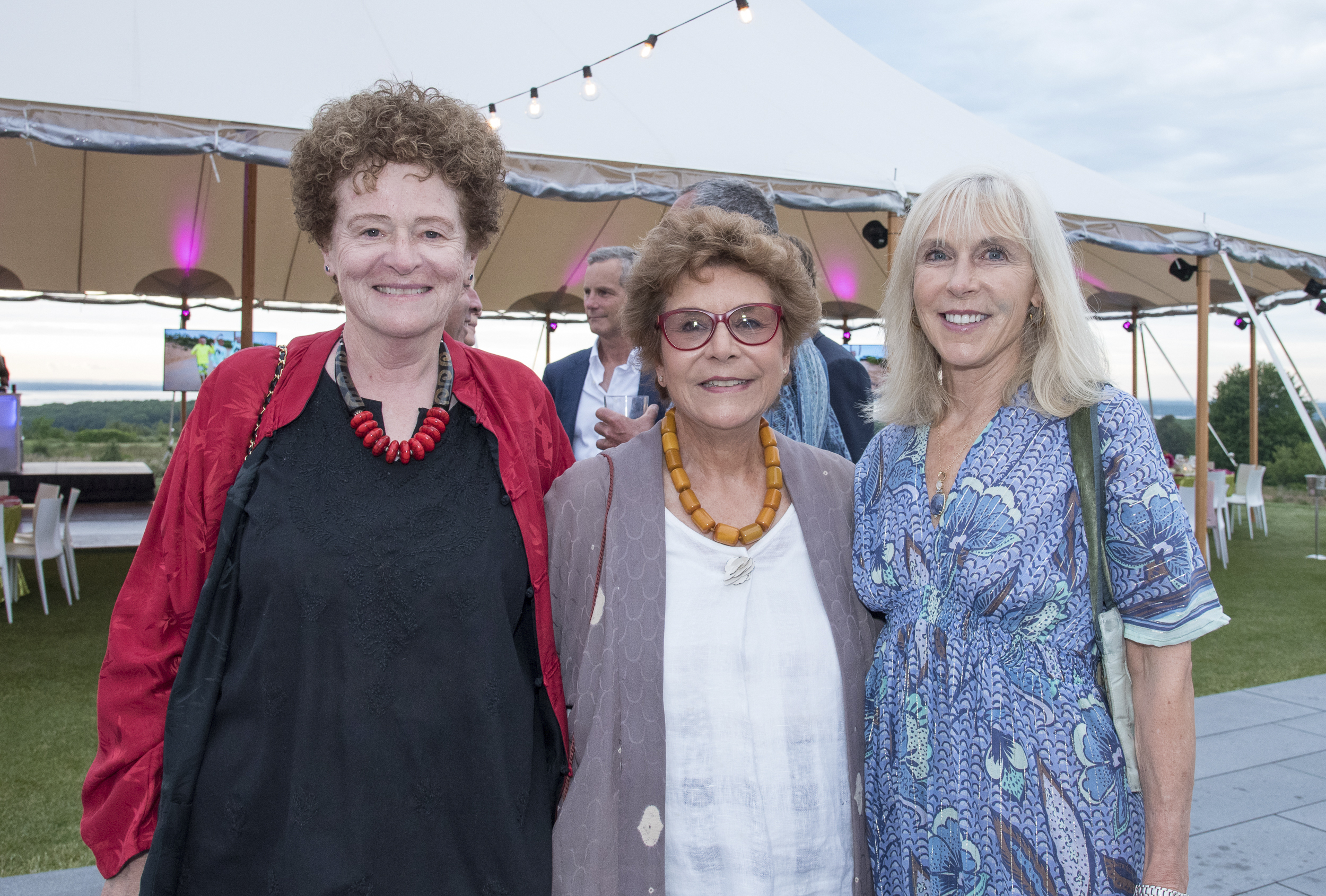 Deborah Kooperstein, Jacqui LoFaro and Elyn Kronemeyer at the Group for the East End's Swing into Summer benefit on Saturday at The Bridge in Bridgehampton.   LISA TAMBURINI