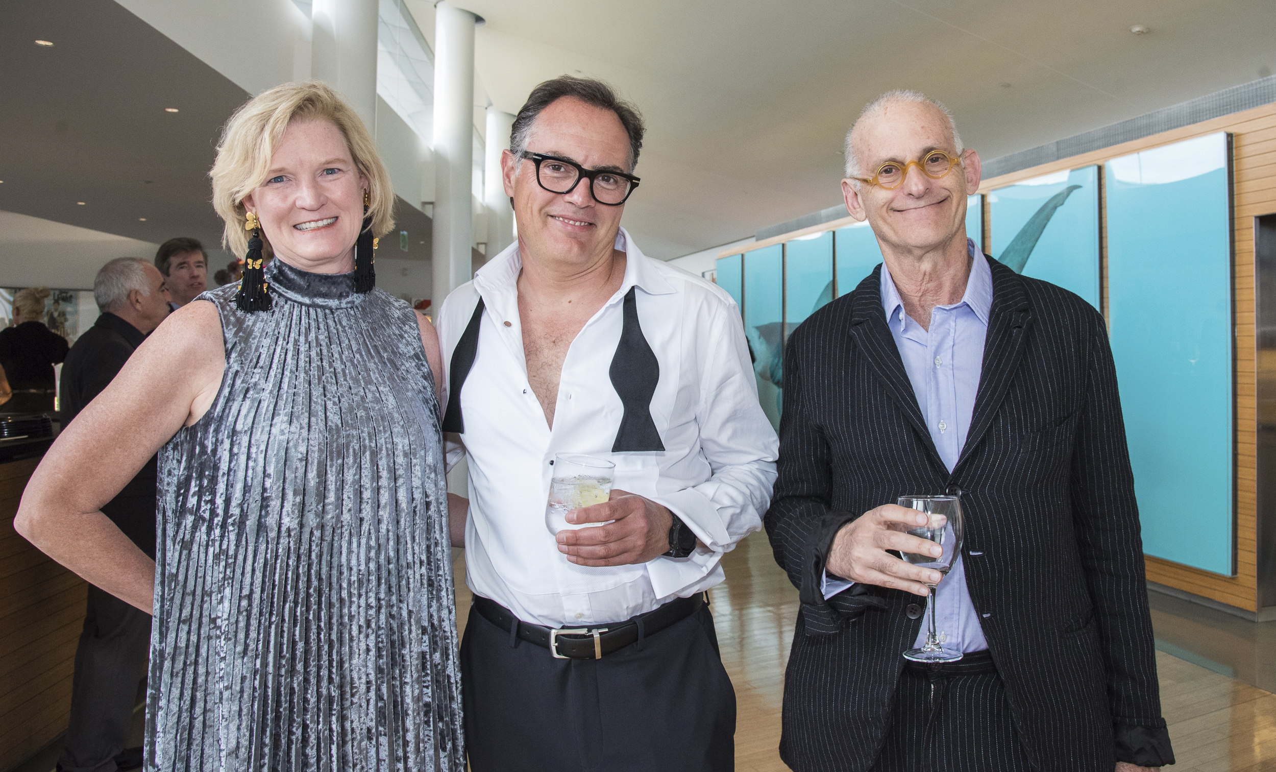 Genevieve and Rob Lynch, and honoree Robert Rubin at the Group for the East End's Swing into Summer benefit on Saturday at The Bridge in Bridgehampton.   LISA TAMBURINI