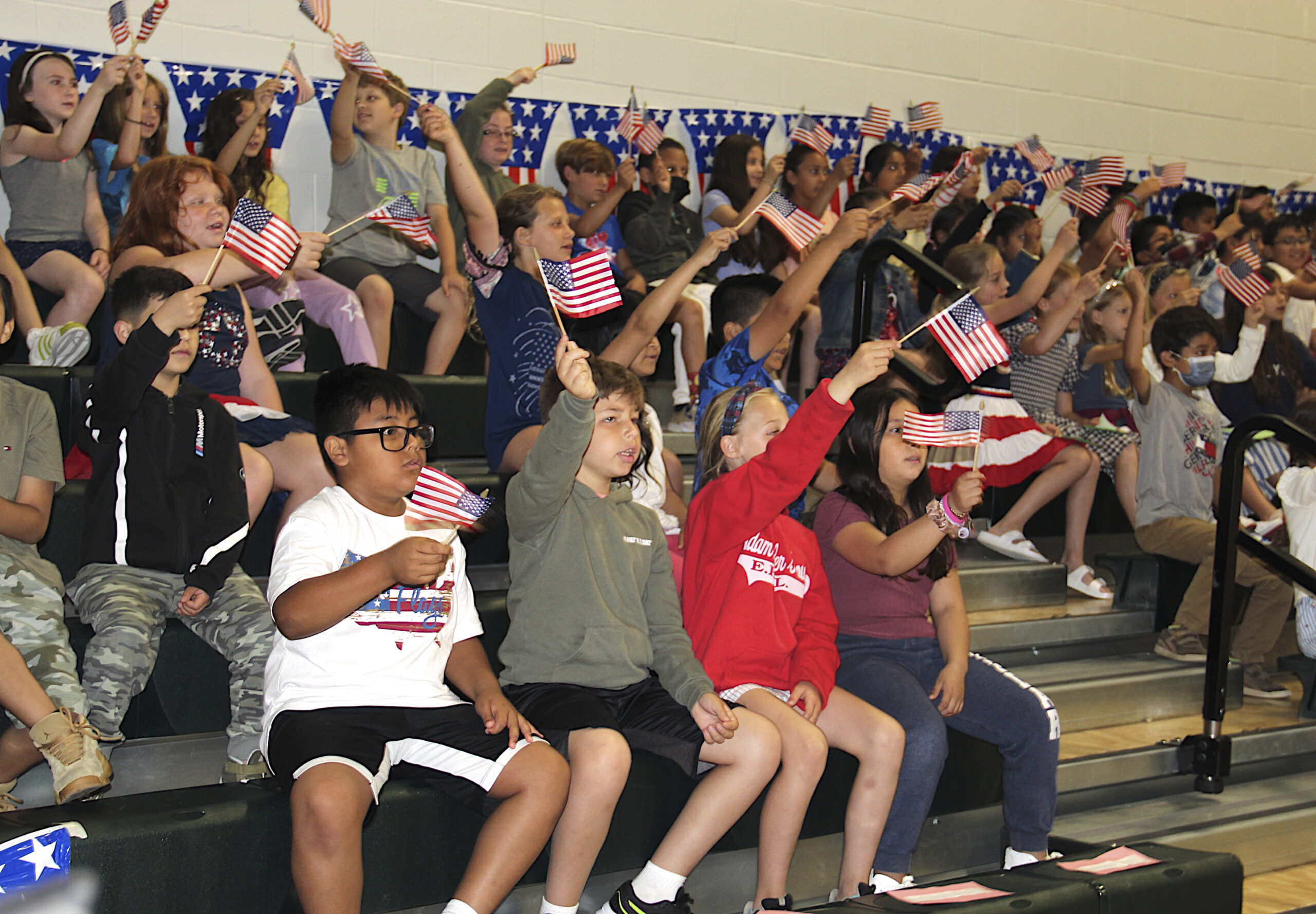 Students during the Springs School Flag Day ceremony on Tuesday, June 14.  KYRIL BROMLEY