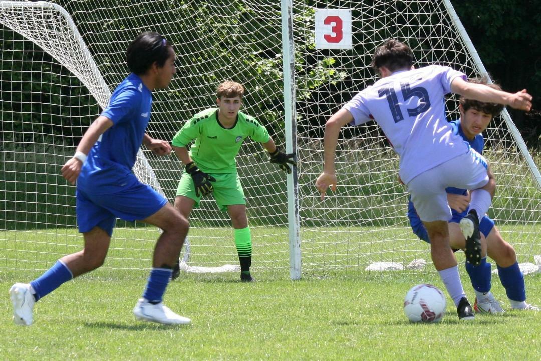 Southampton United players Erick Campohermoso, Alex Posada, and goalie Andy Panza in the team's 2-1 in the finals of the Eastern New York State Cup on Sunday, June 5. ANGELA PANZA